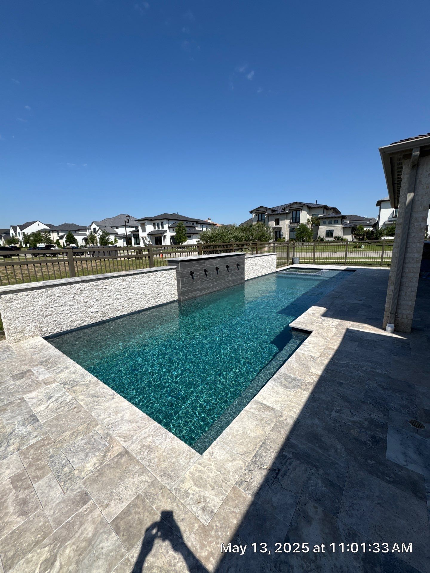 Geometric Pool with Raised Stone Scupper Wall and Outdoor Kitchen by Pinnacle Pools and Spas - DFW