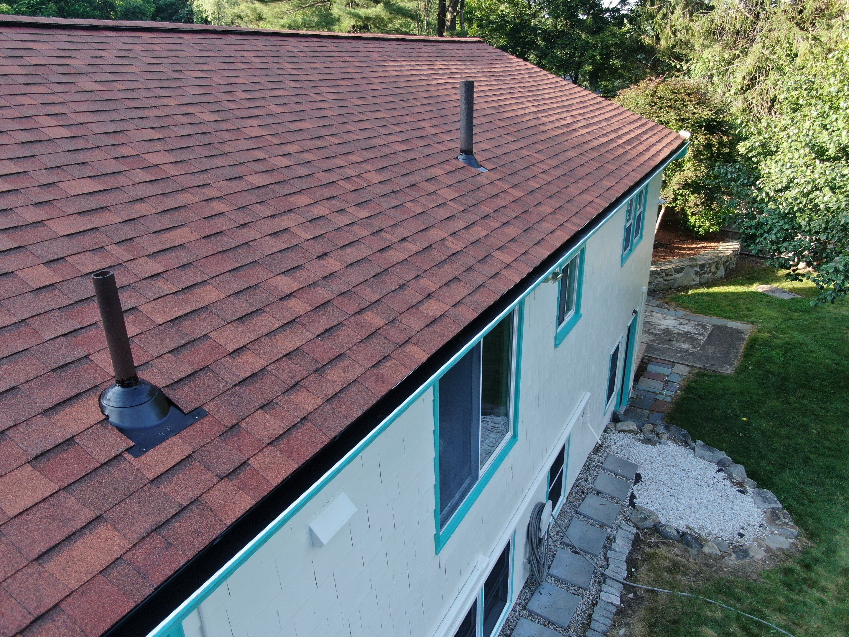Roof Replacement with Gutter Guards – Westford, MA by Mighty Dog Roofing of Greater Middlesex County