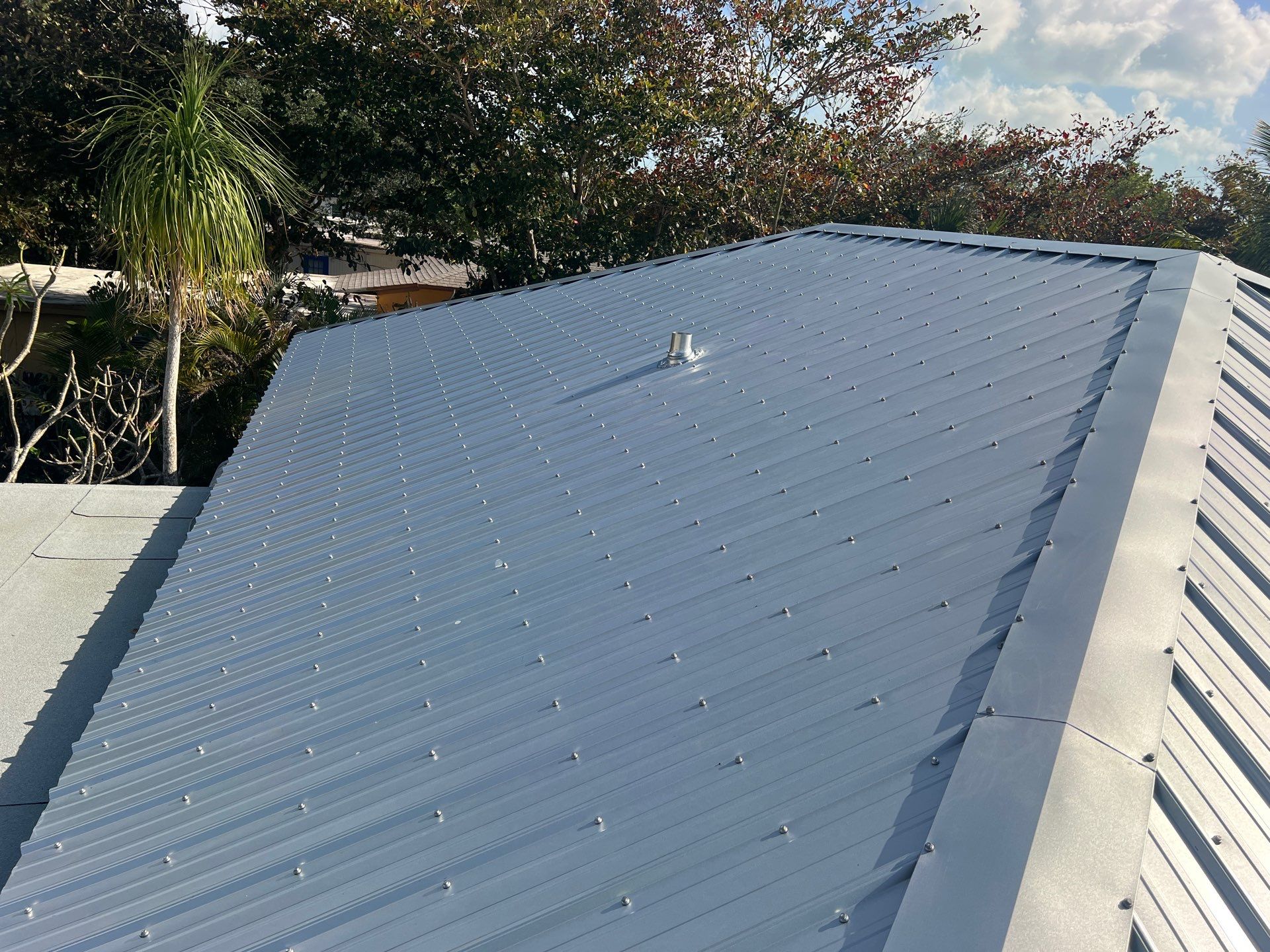 Residential Roofing Installation using Durabull Classic Rib Panel by Durabilis Roofing INC