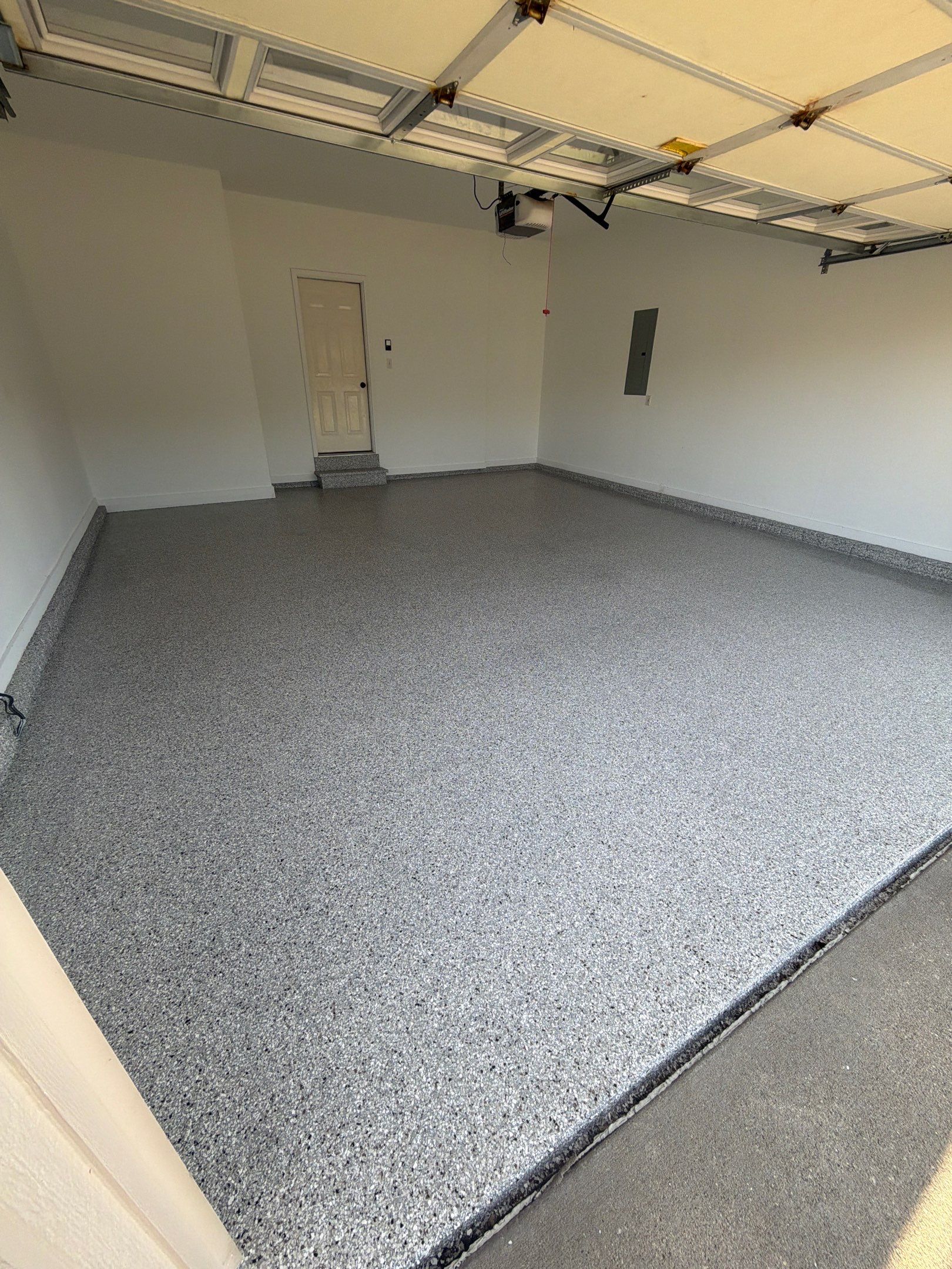 Urbandale Garage Transformation by Revival Concrete Coatings