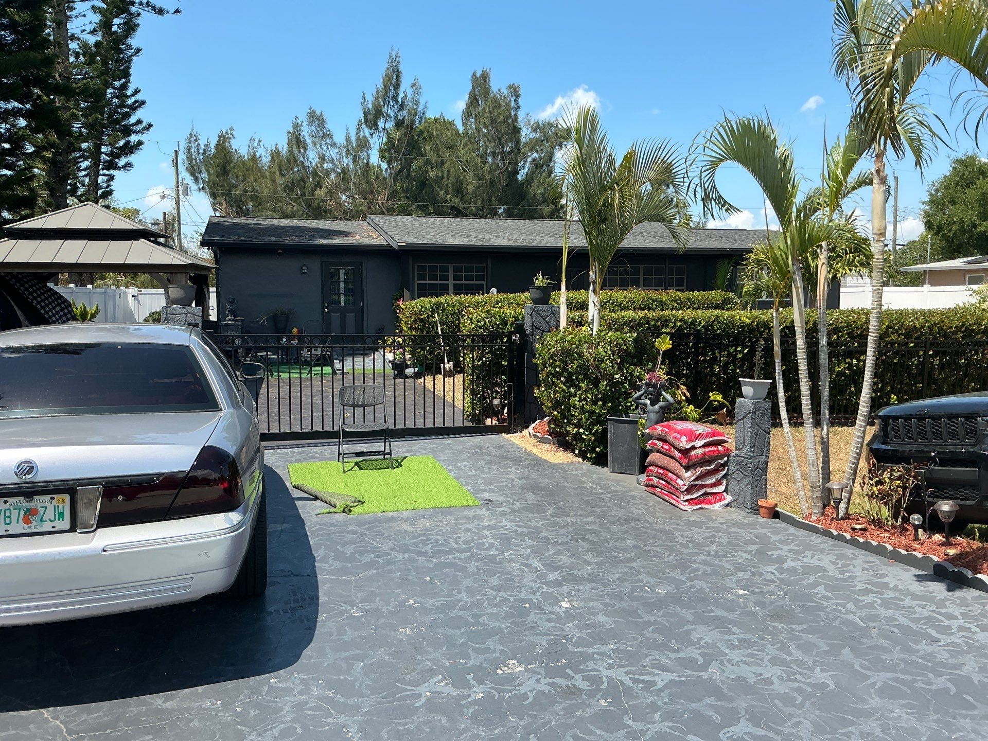 Black 7-Inch Gutters with Matching Downspouts in Fort Myers FL by Gutter Professor by Gutter Professors