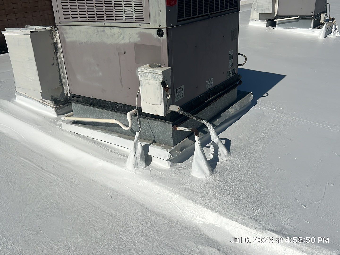 MR Roofing system using Benchmark/PUMA XL coatings over TPO single-ply roofing by Straight Edge Roofing Inc