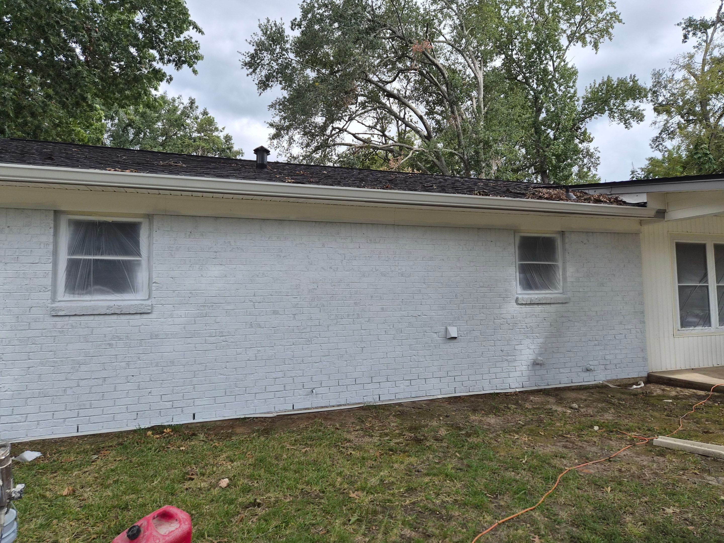 From Basic Brick to Bold Sage Green in Tyler, TX! Quality Coats Painting by Quality Coats Painting