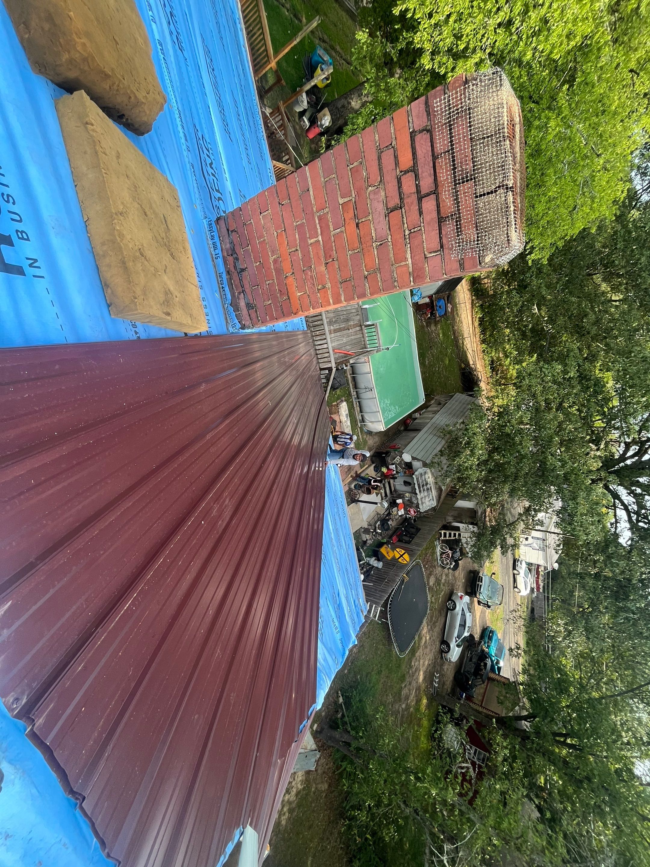 Residential Metal Roof Replacement using Reed's Metals: Colored Residental Panel (Burgundy) by Hostetler Roofing
