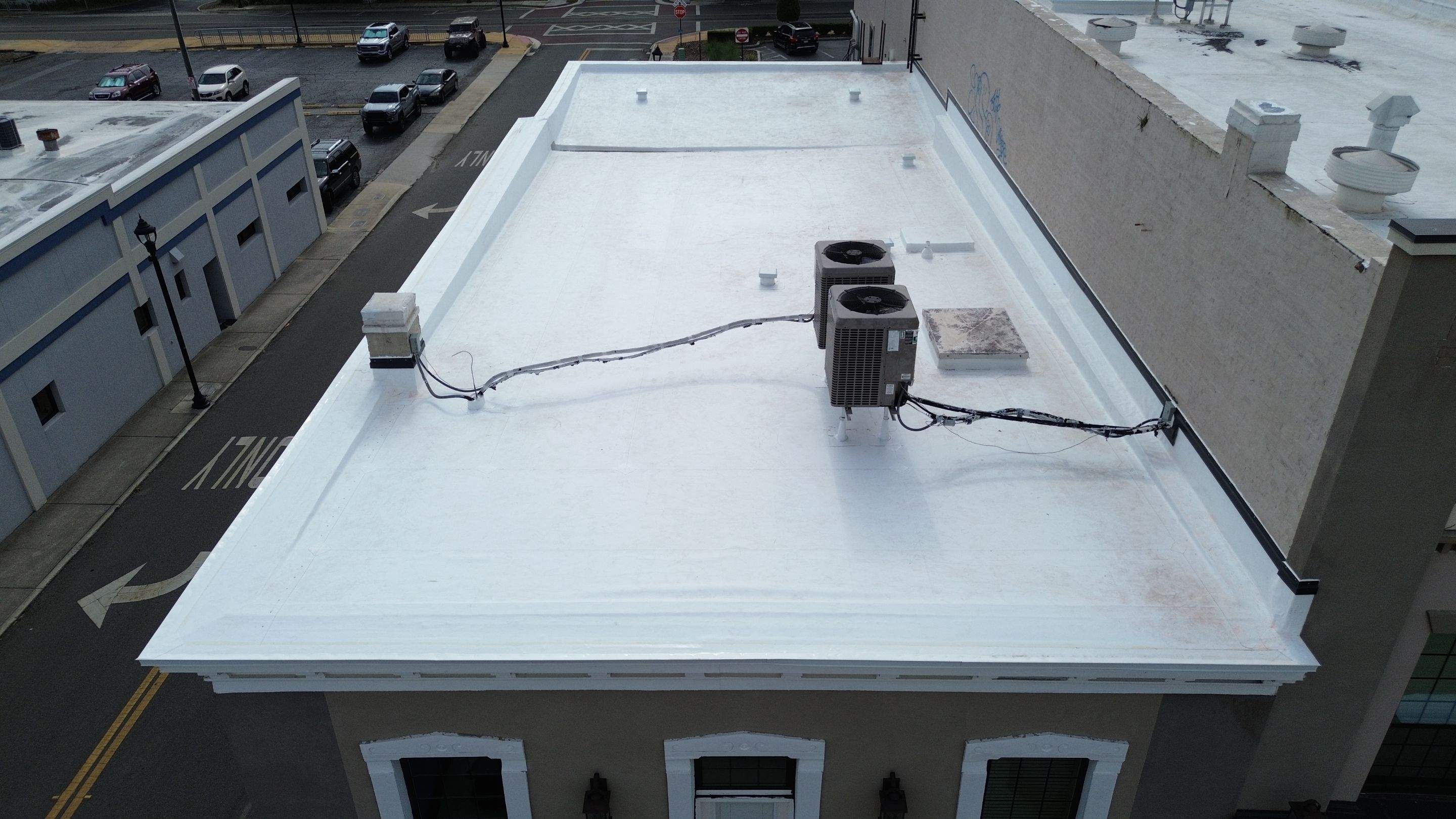 Flat Commercial TPO Reroof in Downtown Ocala, FL by Brehm Roofing