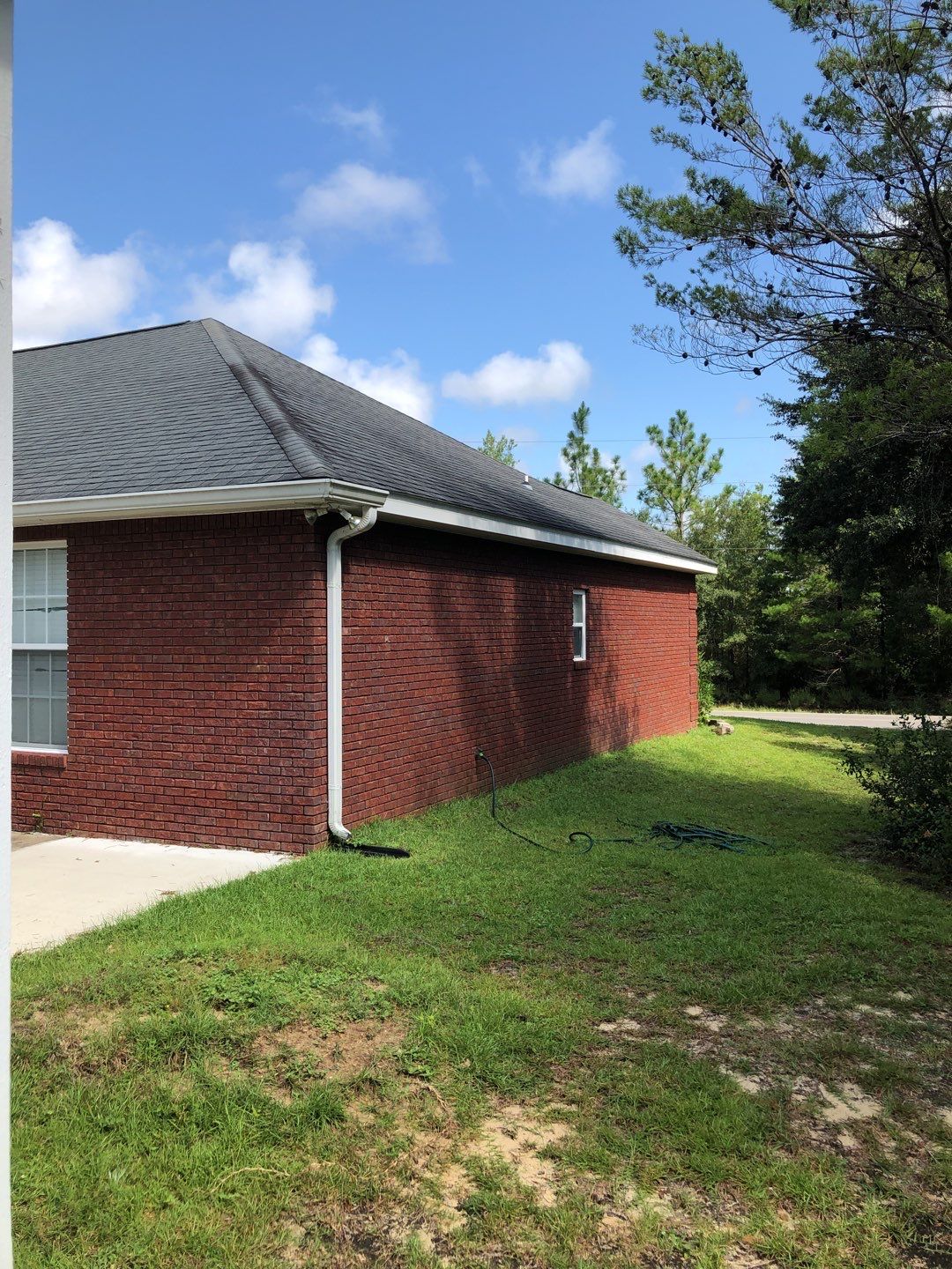Gutter Installation using White K-Style Seamless Gutters by Gutter Professors