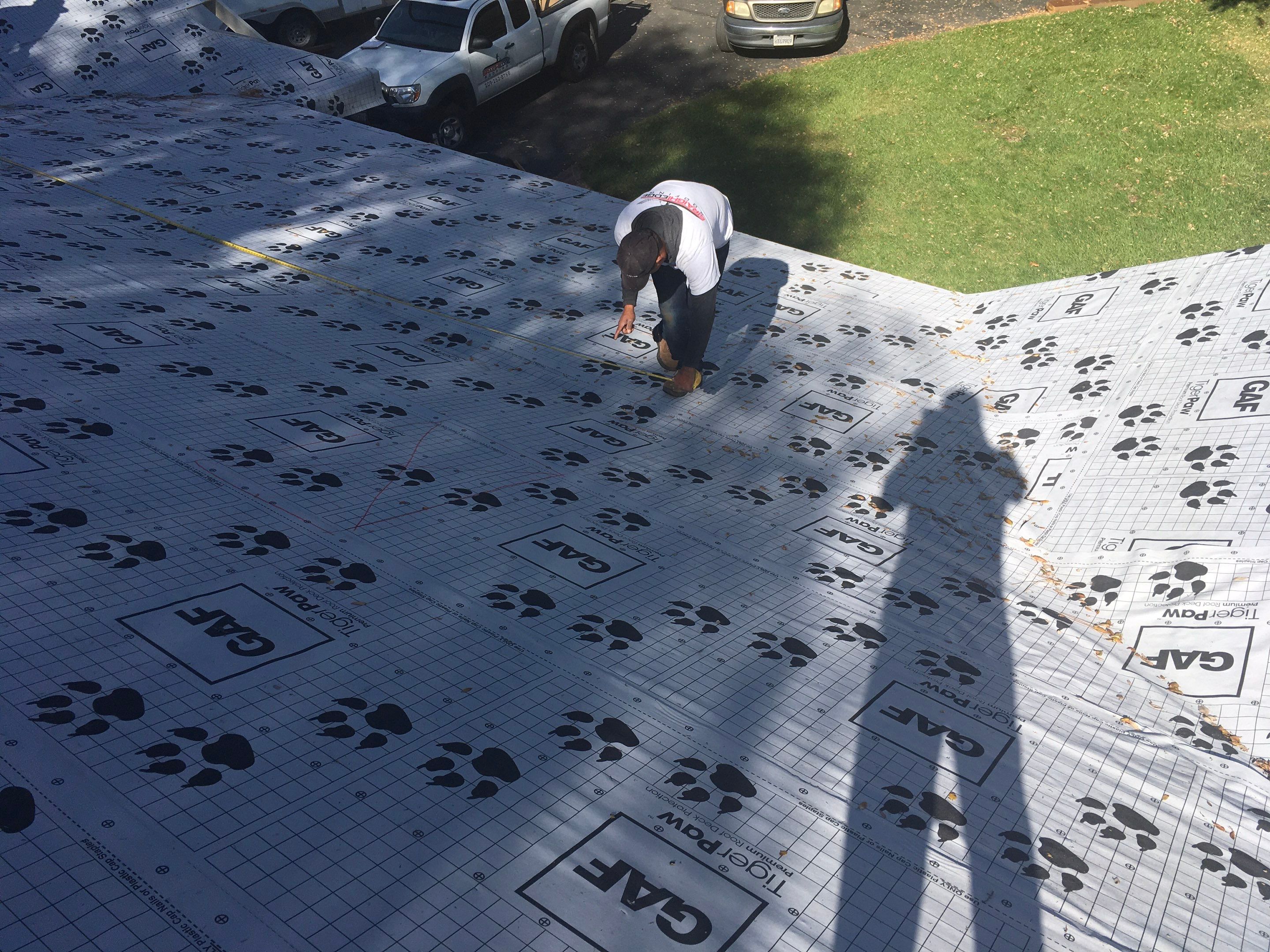 Metal roofing installation using Standing seam metal roofing system by Straight Edge Roofing Inc