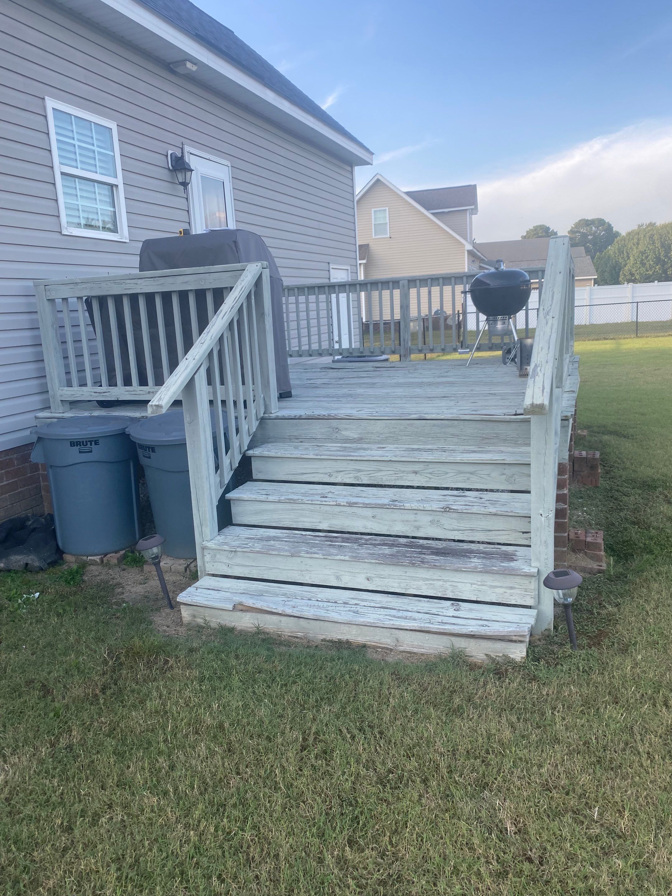 Pressure-Treated Wood Deck Resurface and Railing Replacement in Battleboro by The Remodeling Company