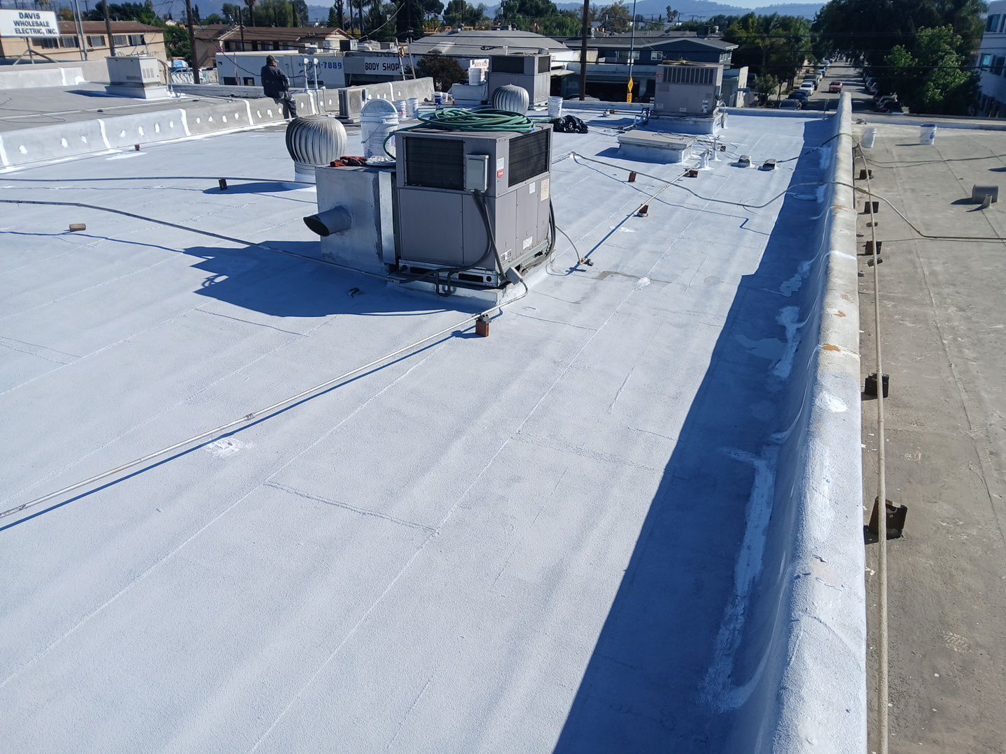 Silicone Application Project on a Commercial Property by Hull Brothers Roofing
