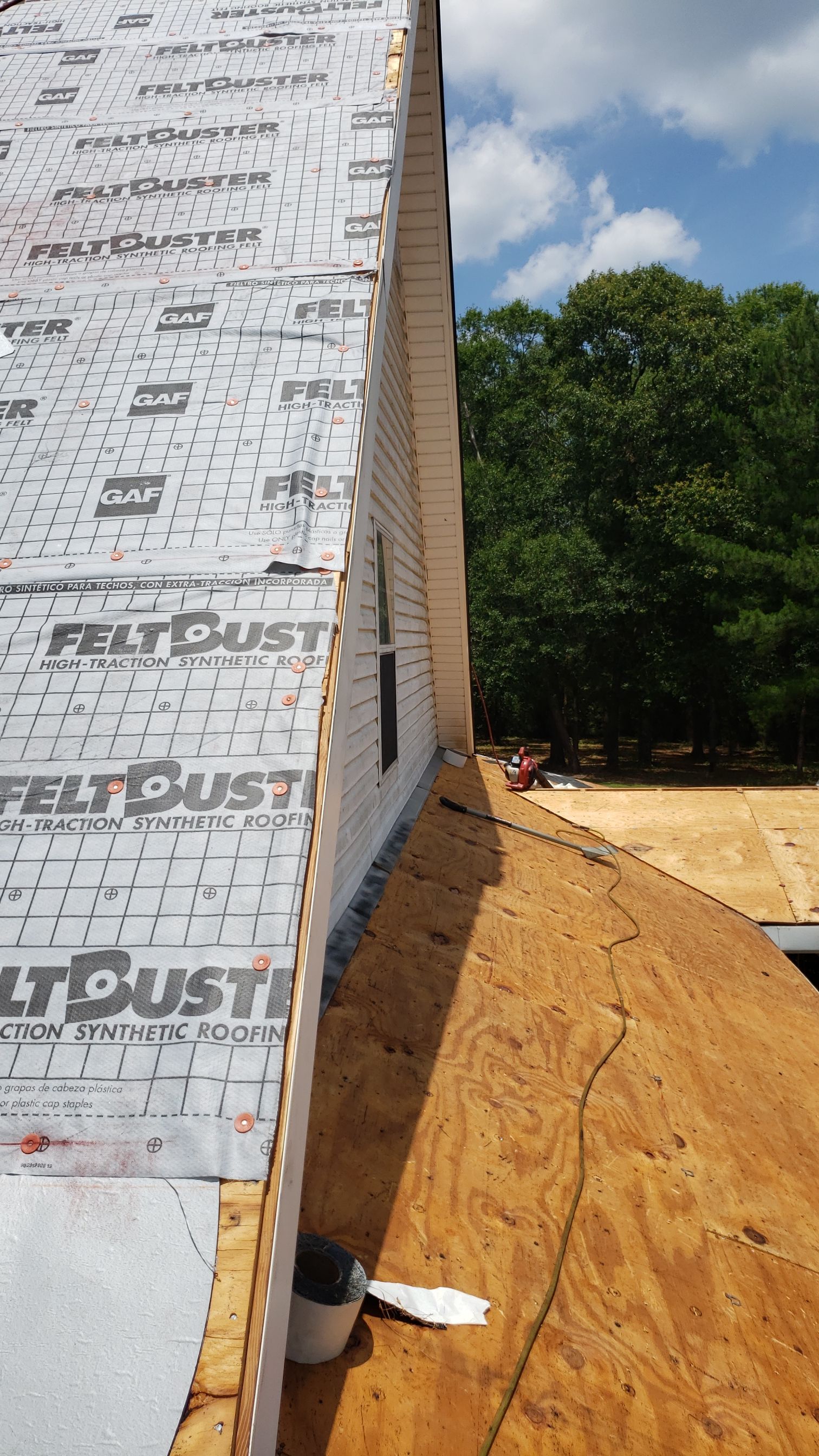 Residential Roofing Installation using Roof Replacement by American Roofing & Construction LLC
