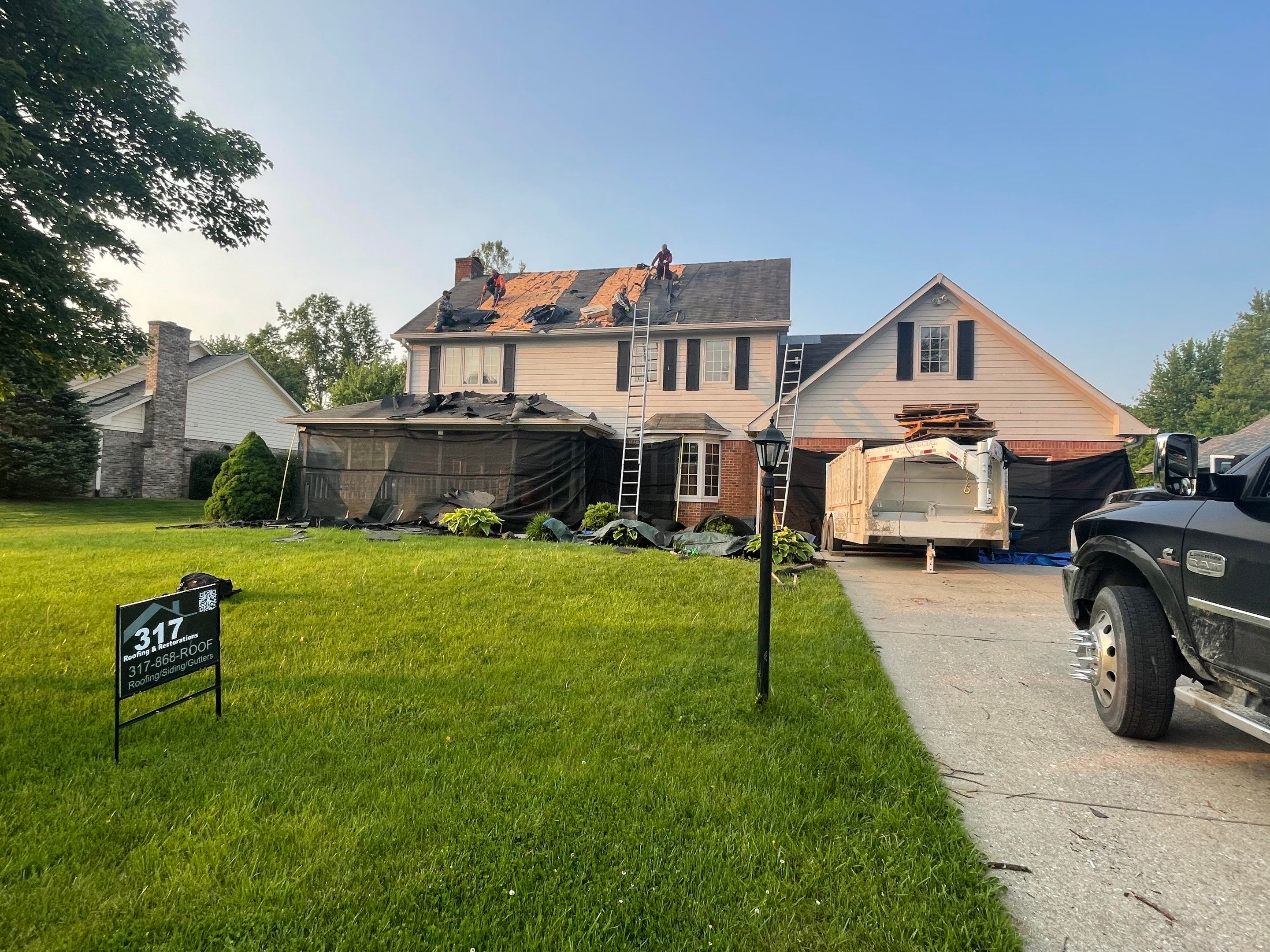 Tornado damage in Whiteland. Roof replacement, James Hardie siding, exterior paint, gutters, windows, doors by 317 Roofing & Restorations
