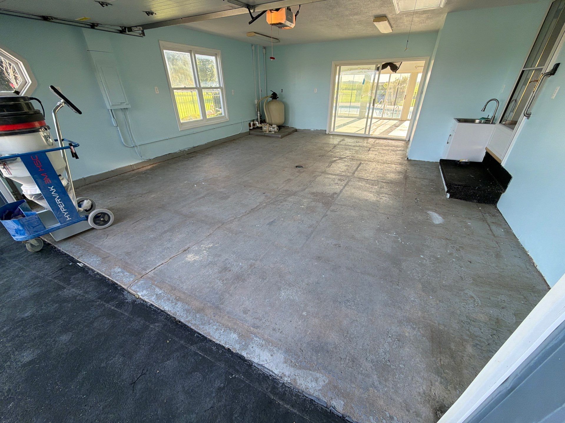 Vintage Cobalt Garage Coating by NG Masonry & Construction LLC