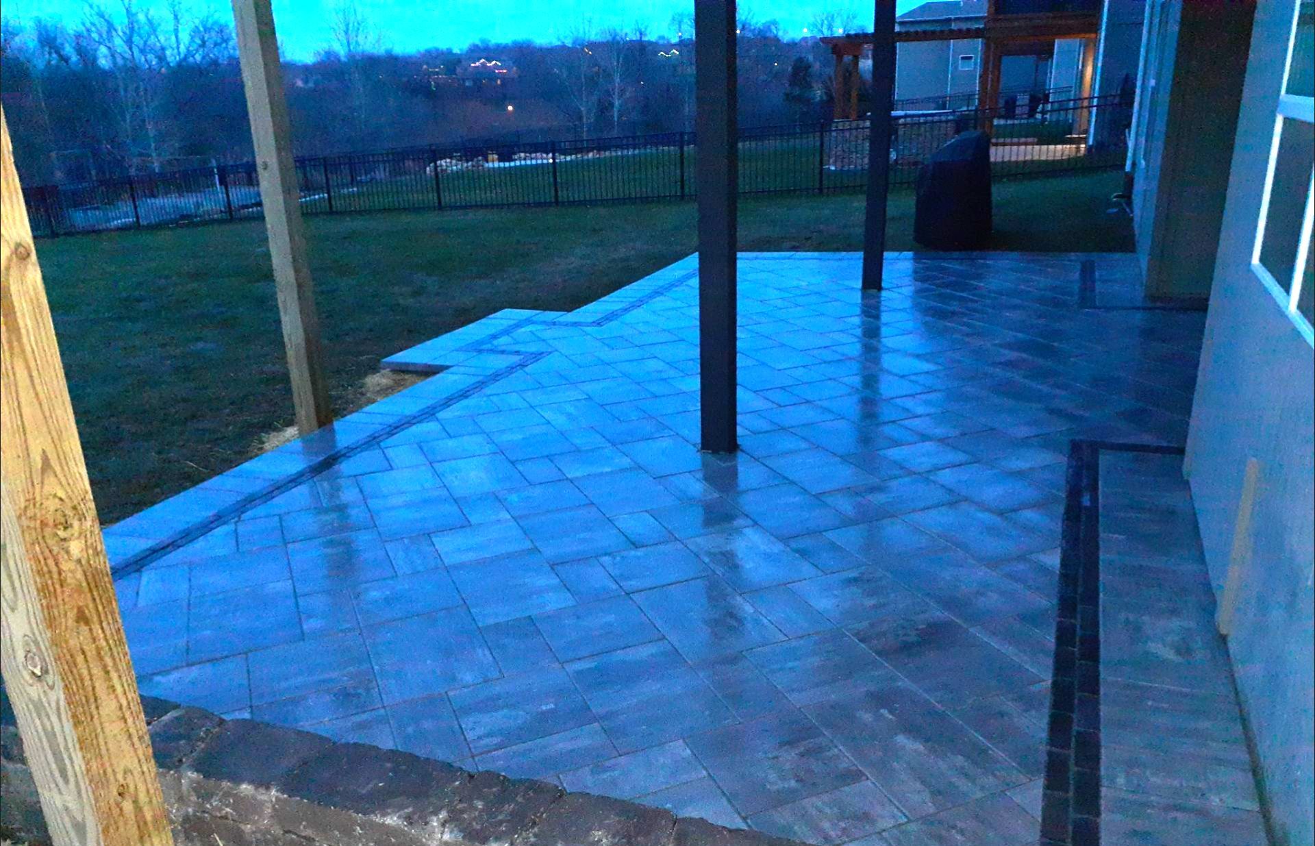 Back Yard Paver Patio by LAND ESCAPES LLC
