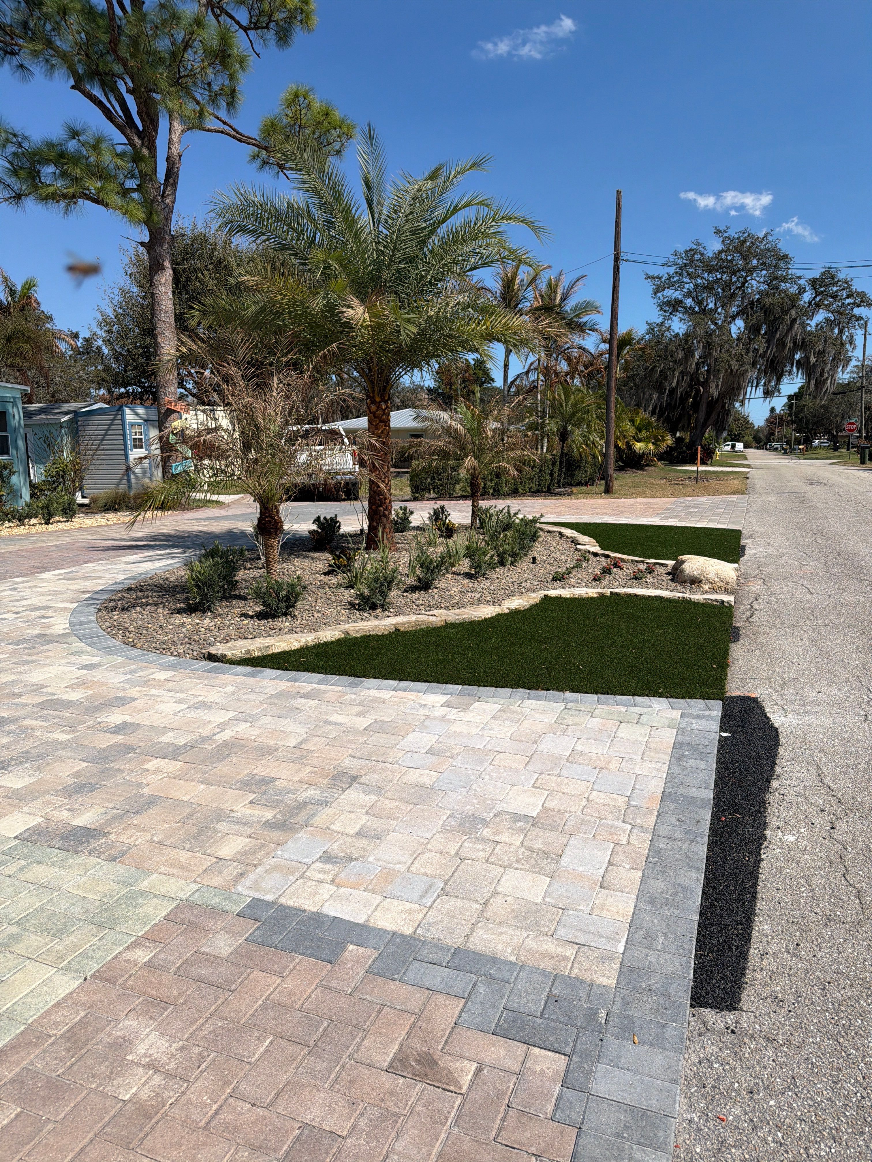 Alpha Zeta Office Front Landscape & Paver Renovation by Alpha Zeta Enterprises Inc