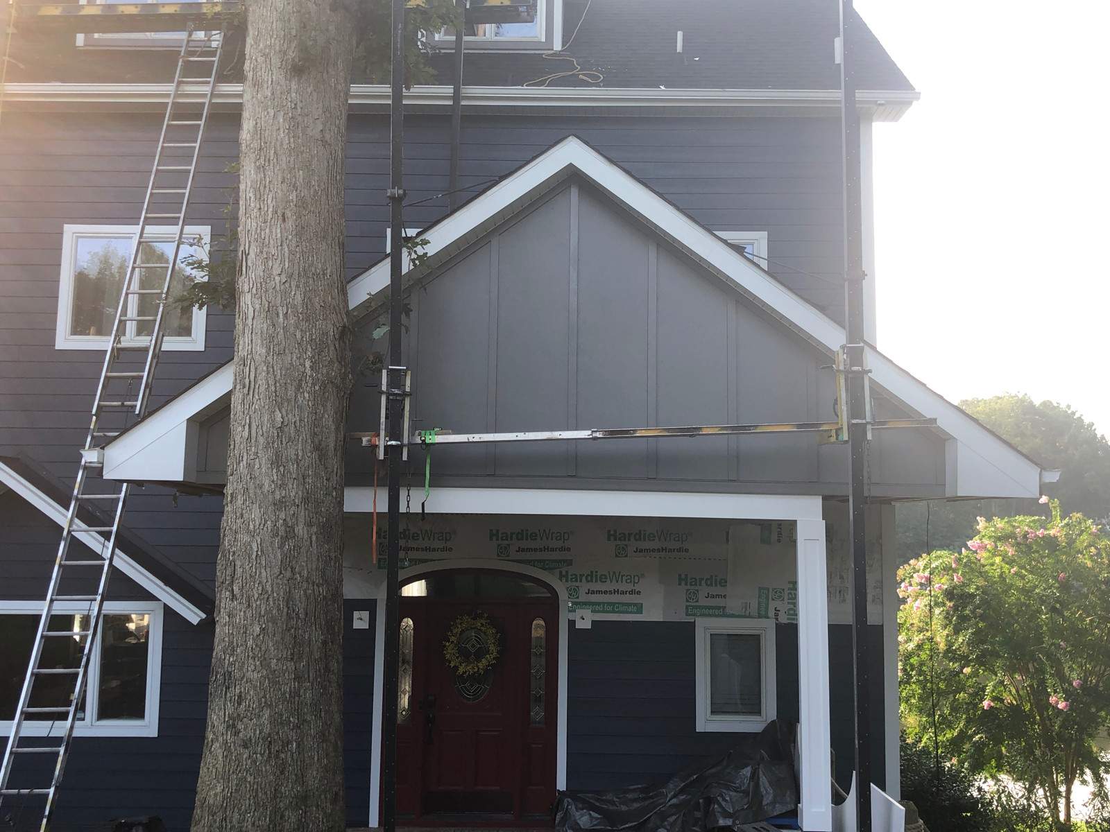 Siding Installation using JH Batten Smooth and JH Cedar Mill Plank by ExteriorPros