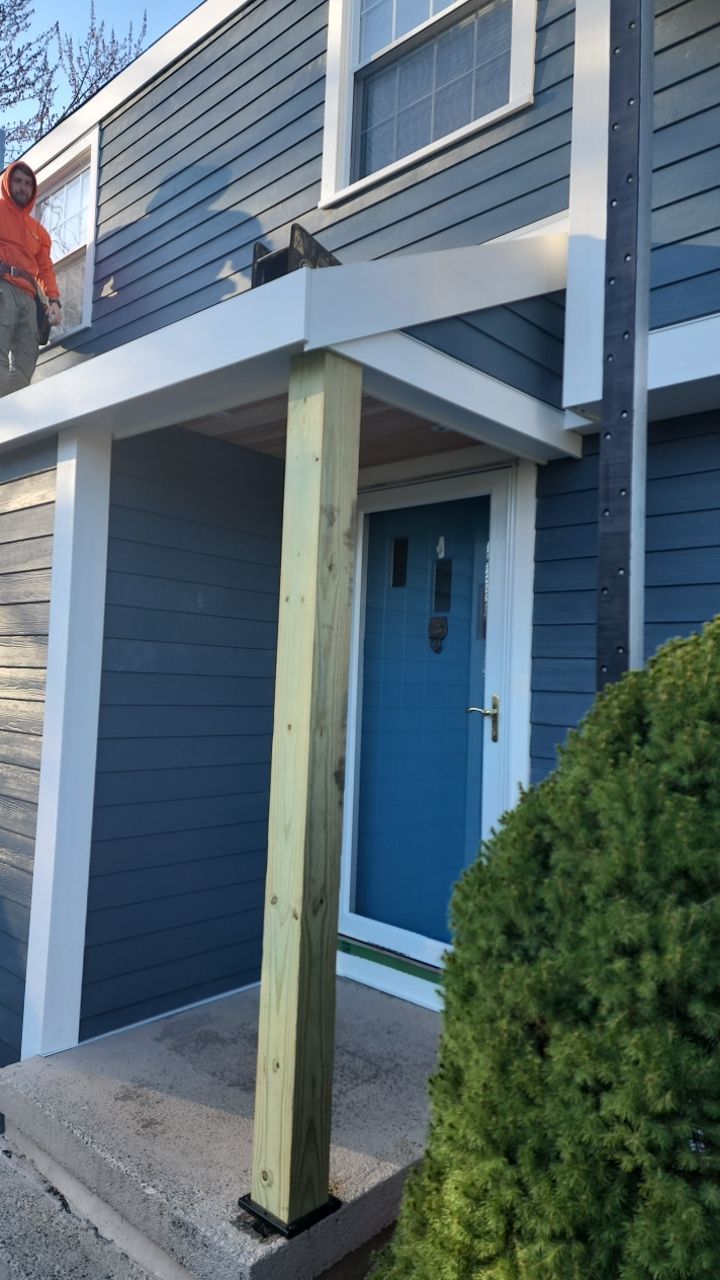 James Hardie siding, new metal roof and couple windows being installed. by UBrothers Construction