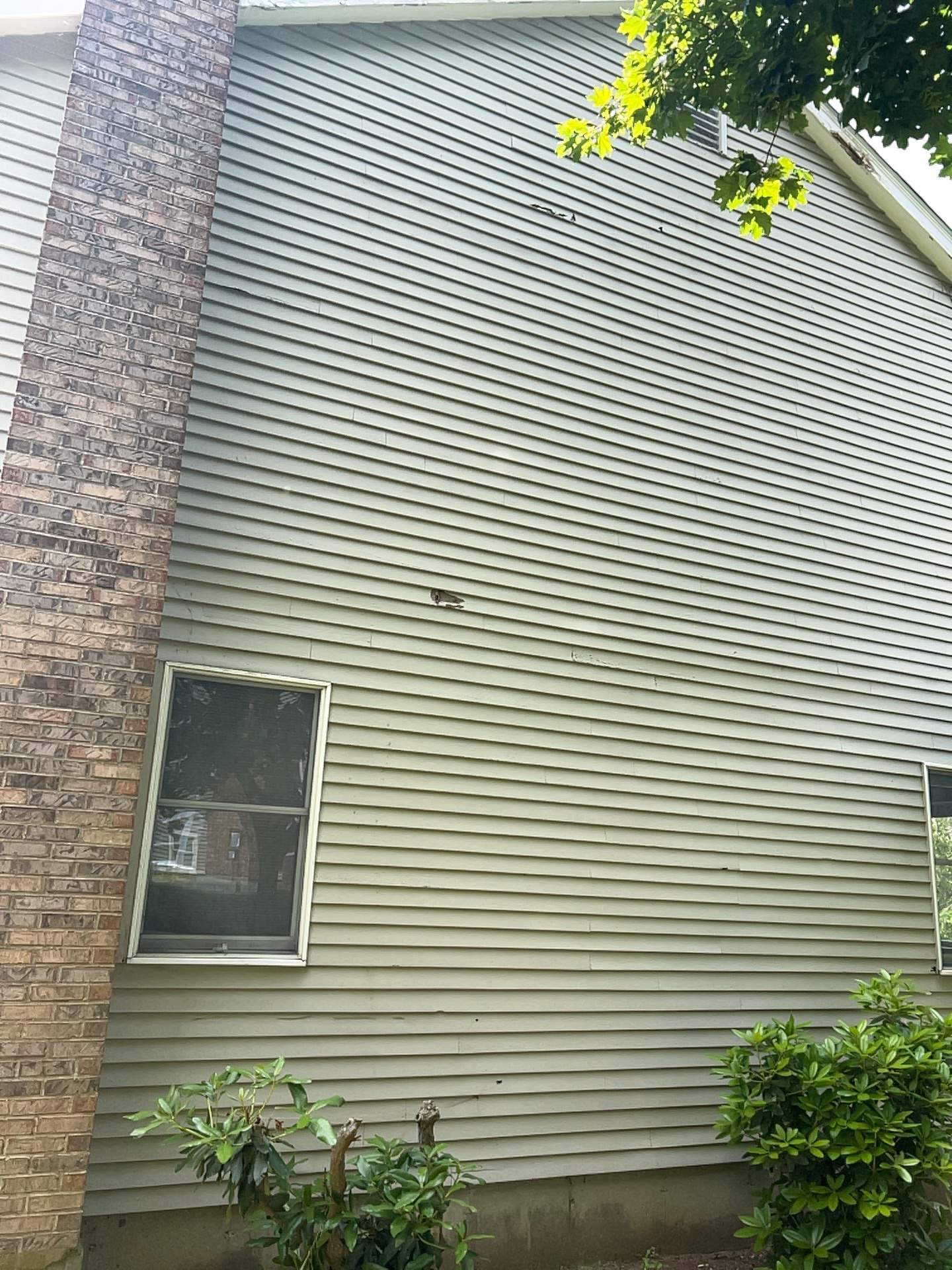 Siding Installation using Mainstreet Colonial & White gutters by A Plus Exterior