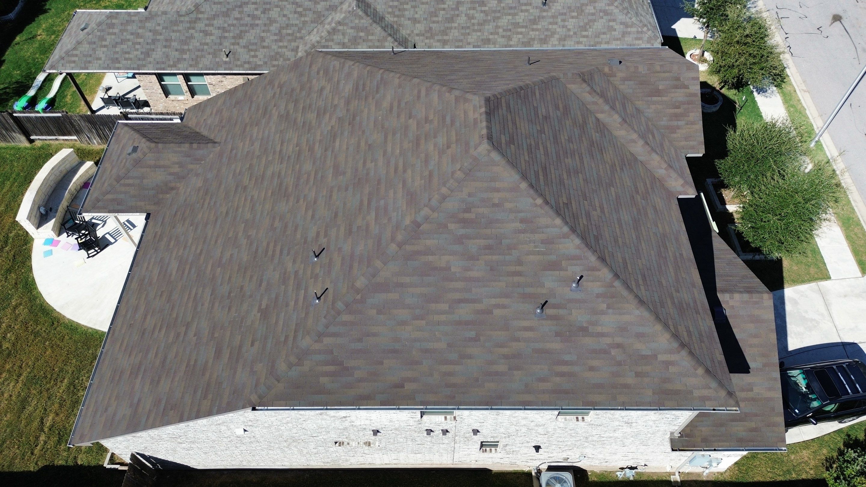 Residential Roof Installation ā Supreme Teak Shingles | Leander, TX by Kstylez Roofing & Construction