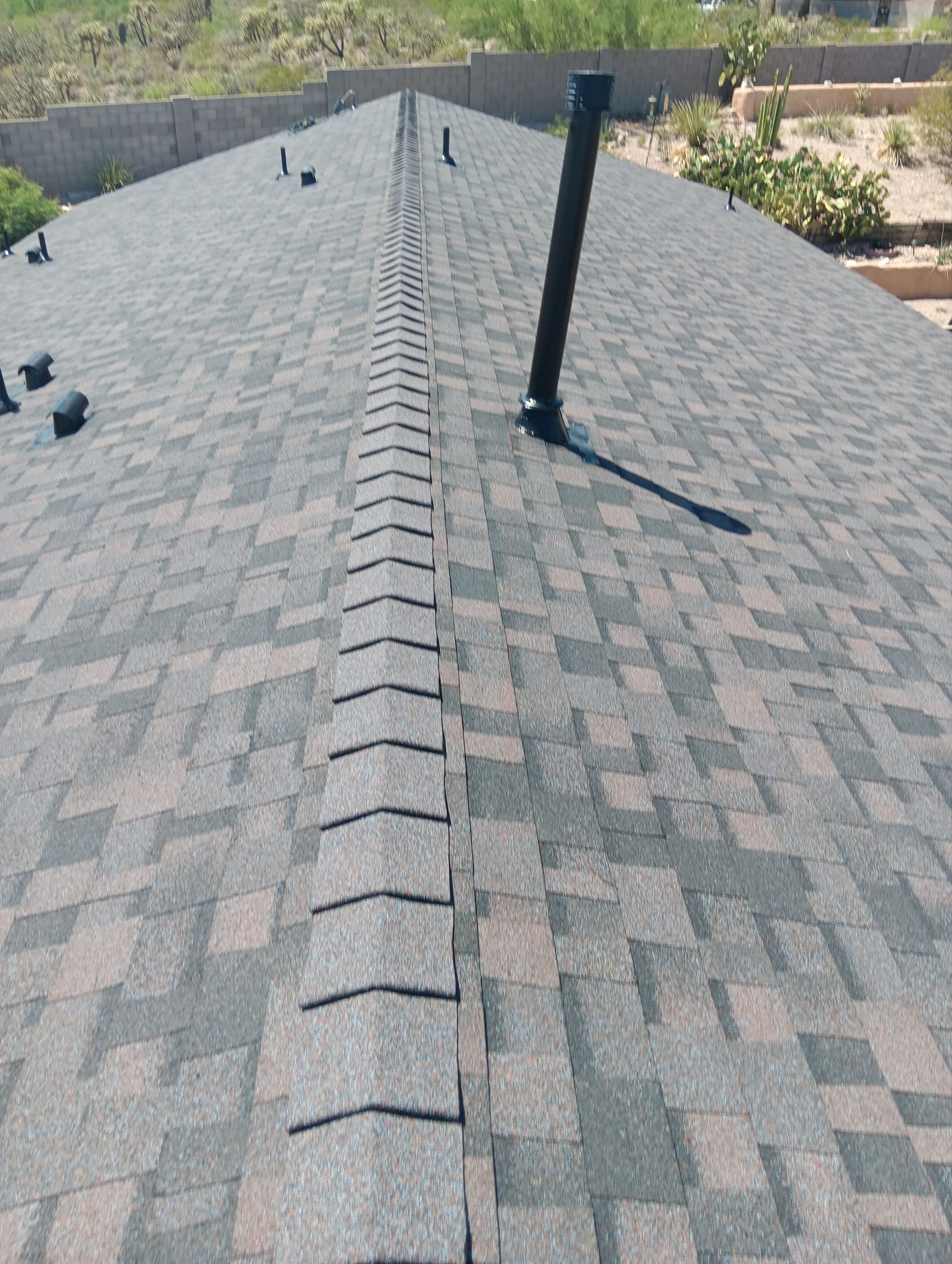 Charcoal Shingles by Reimagine Roofing