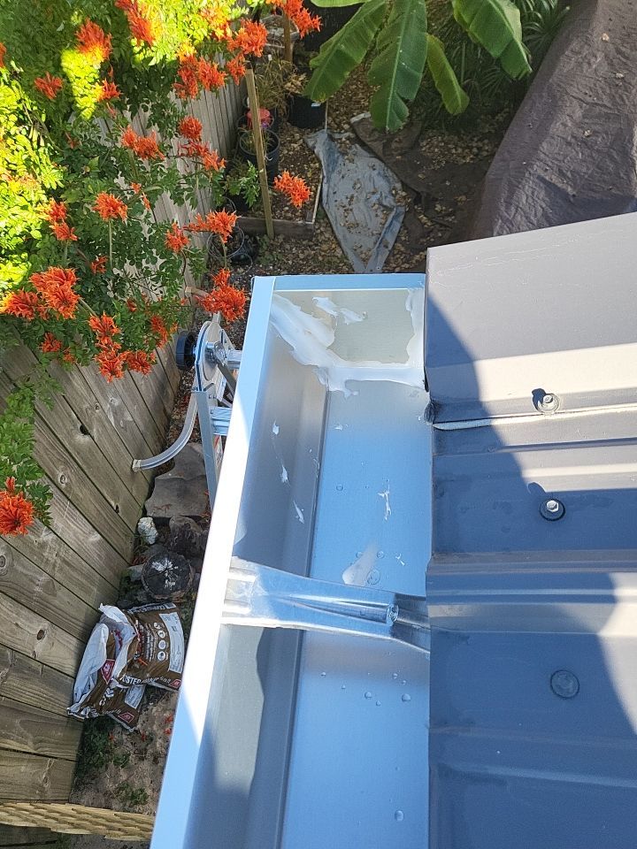 Gutter Installation using K-Style White Seamless Gutters by Gutter Professors