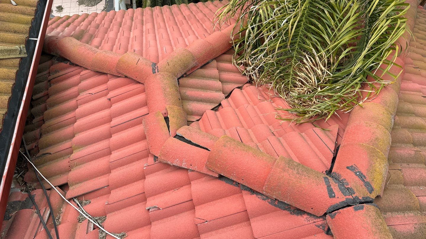 Tile refurbish project using existing tiles and replaced underlayment and battens by Straight Edge Roofing Inc