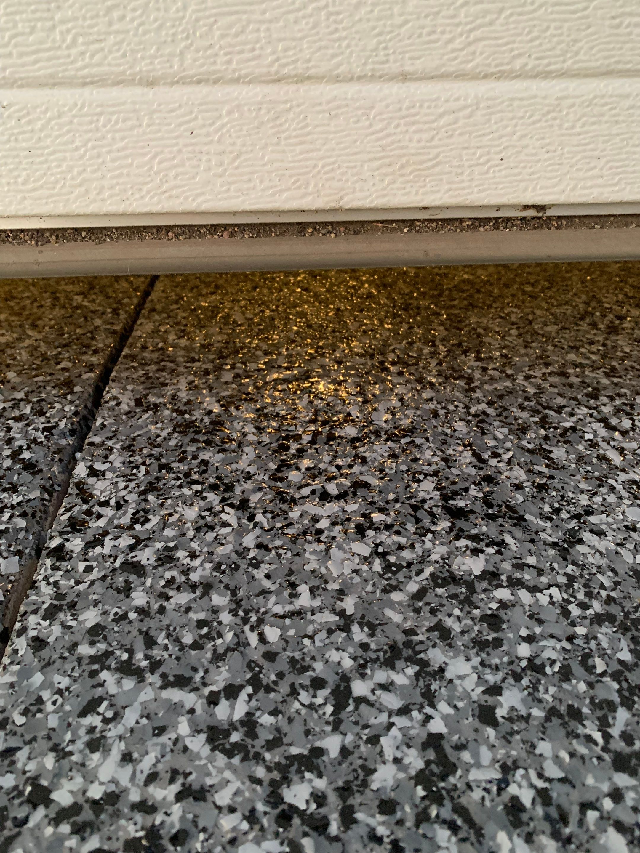 Speckled Epoxy Garage Floor Coating and Concrete Repair in Lennox by Select Painting, Coatings & Garage Cabinets