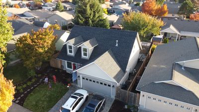Granite Black Residential Roof Replacement by Orezona Building & Roofing Company, Inc.