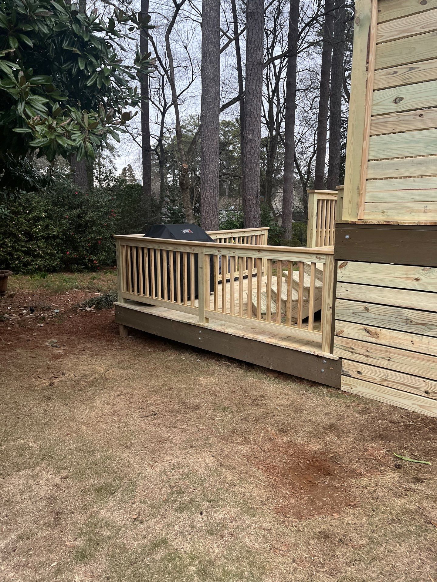 Wood Deck Resurface with Privacy Wall in Buckhead, GA by Nelson Exteriors