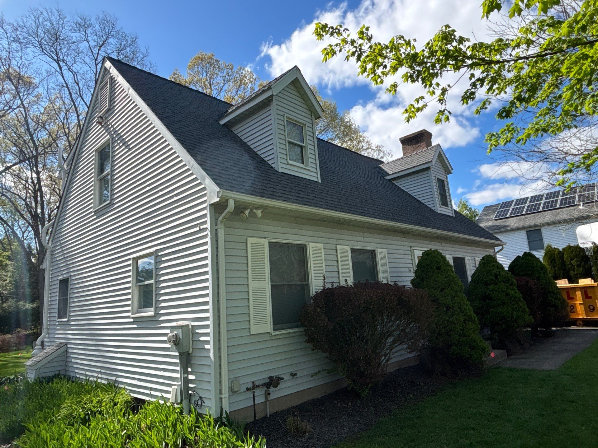 Gorgeous newly shingled home gets the DiGiorgi touch! by DiGiorgi Roofing and Siding Inc