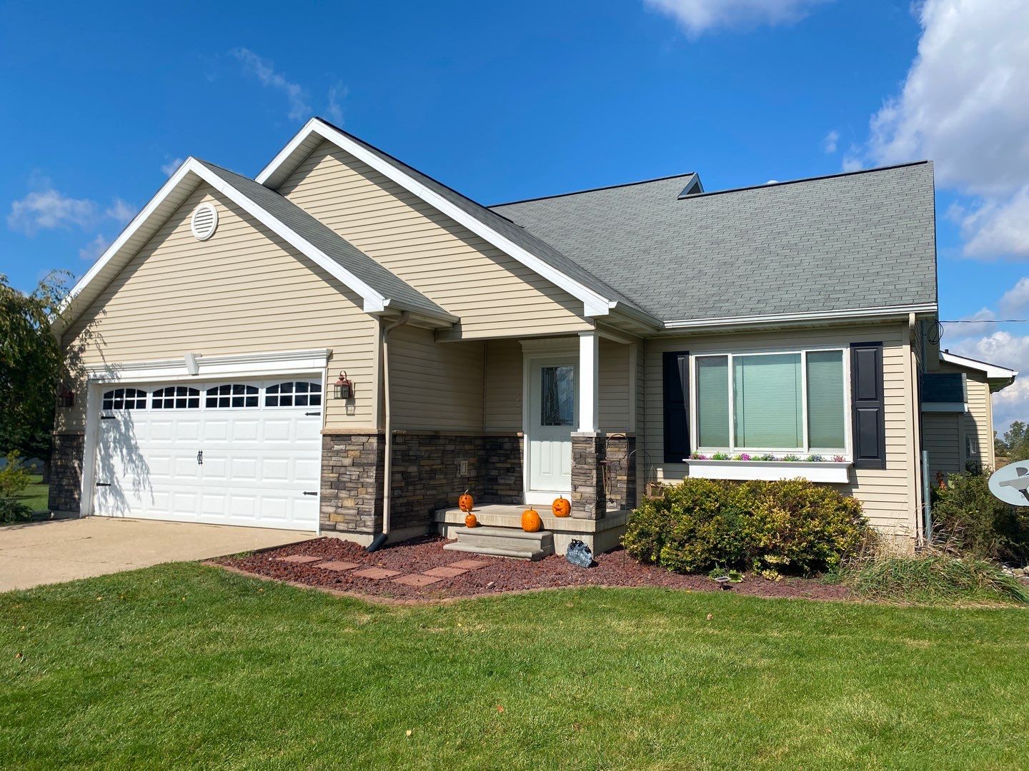 Siding Installation using Versetta Stone by Acme Exteriors