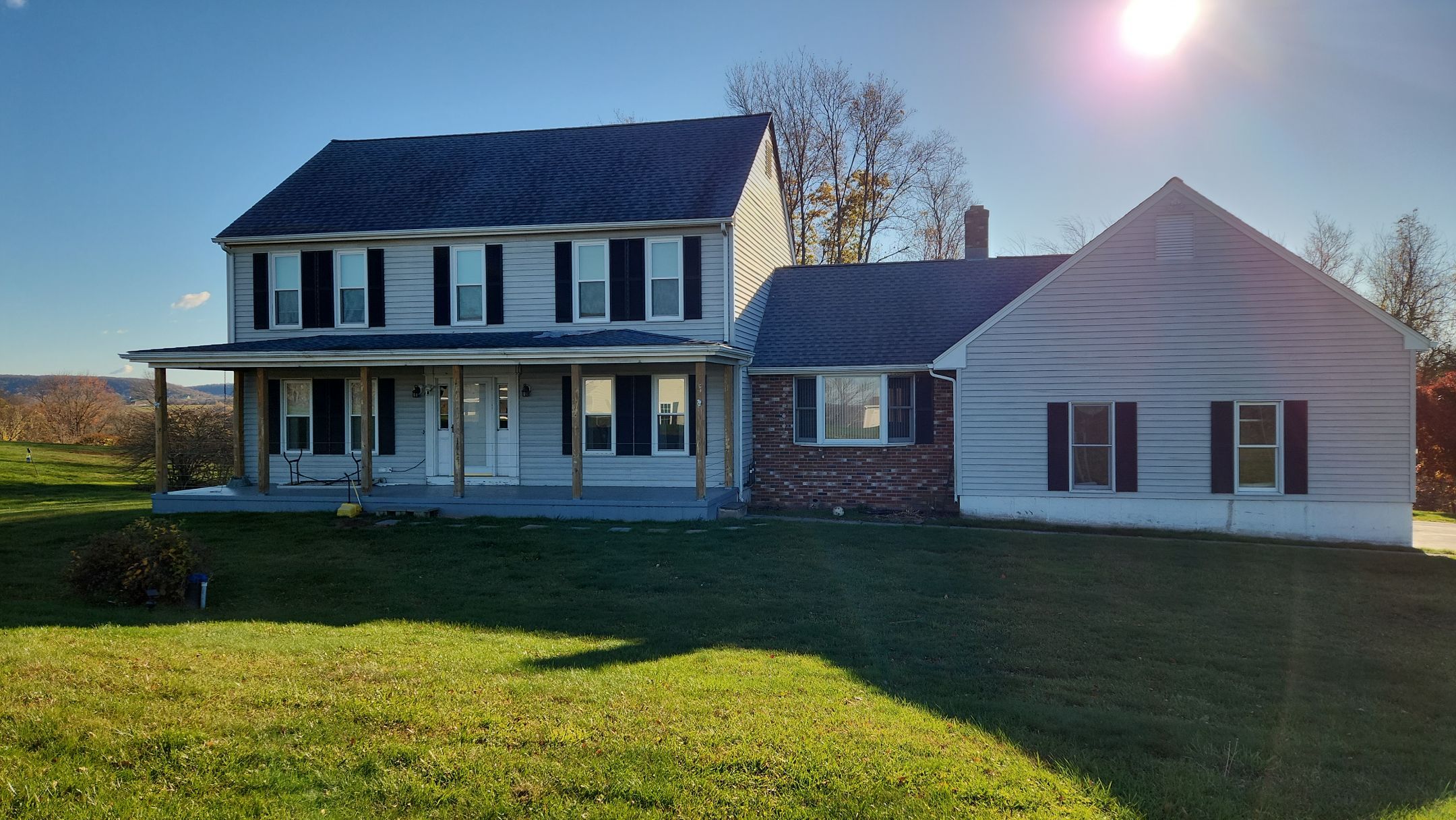 Drastic siding color change with Cert. Monogram D/4 x 12'6" clapboard, Smoky Gray by DiGiorgi Roofing and Siding Inc