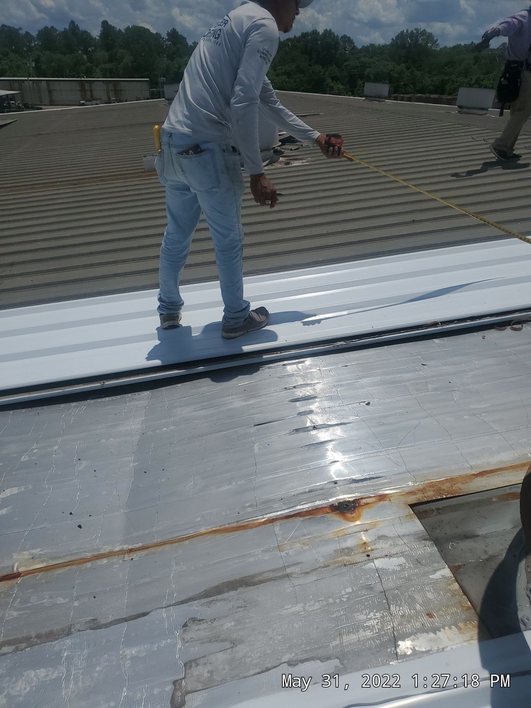 Commercial Roofing Installation using Aluminum Roofing panels by Hostetler Roofing