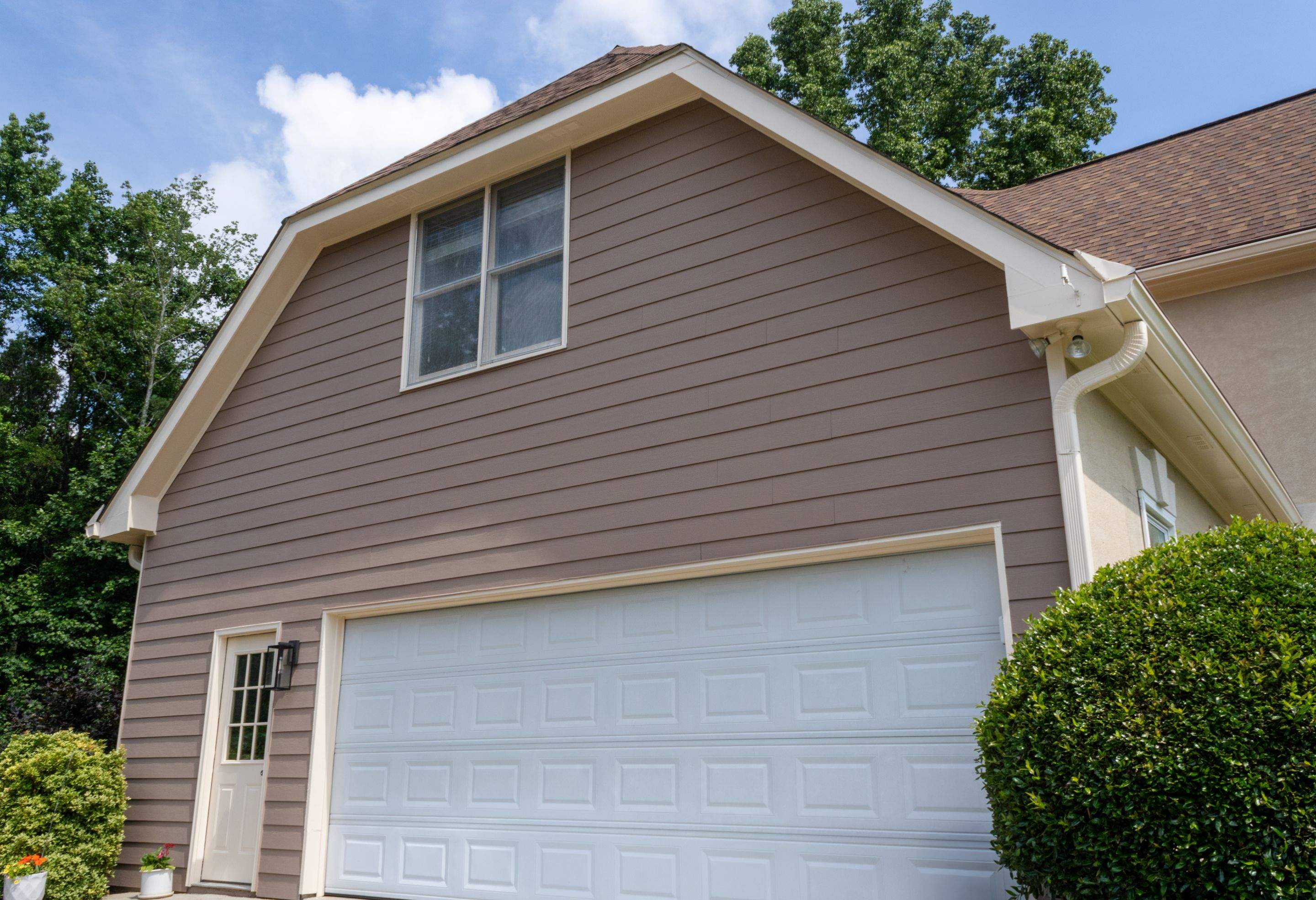 Exterior Painting using Sherwin-Williams and Rotted Wood Replacement by Nelson Exteriors