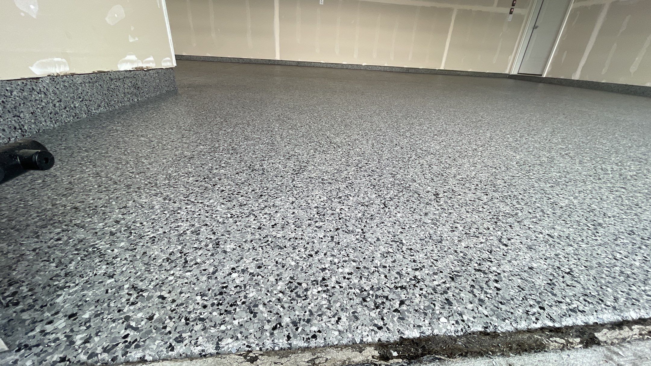 Garage Transformation using Nightfall by Croc Coatings, LLC