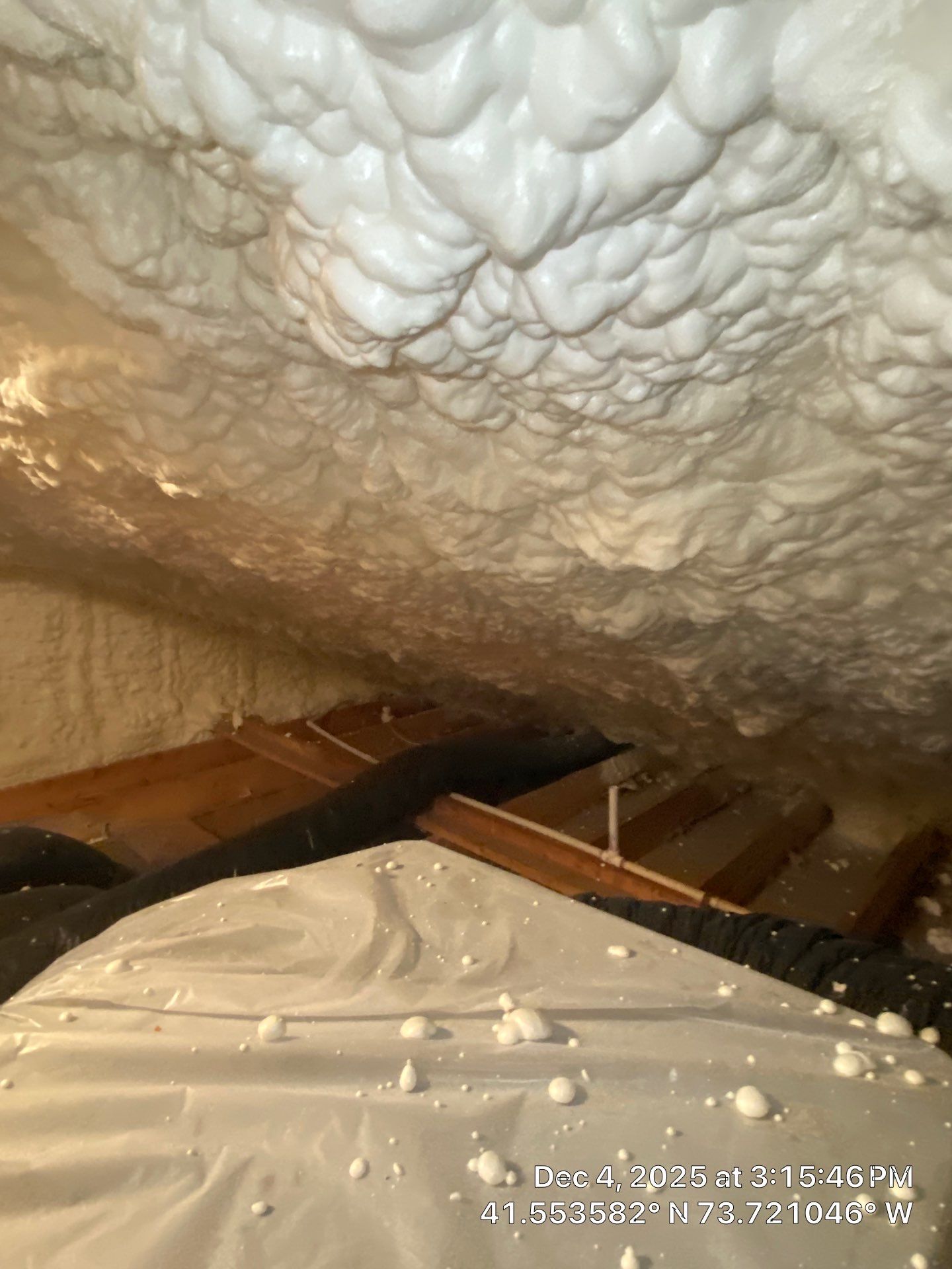 Attic Insulation using open cell spray foam by NYS Foam & Energy