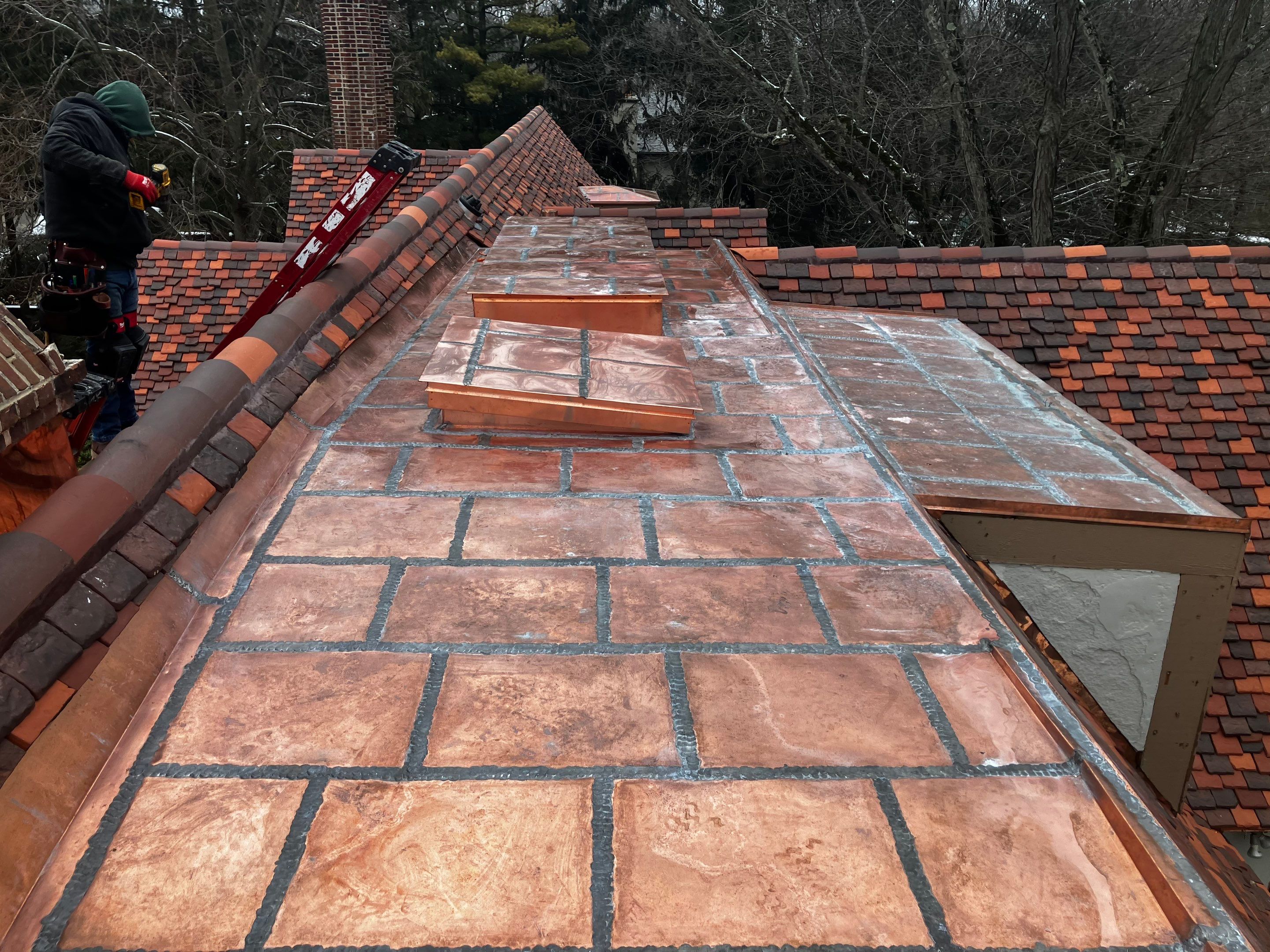 Ludowici Roof Installment and Half Round Copper Gutter Replacement  by Custom Installations