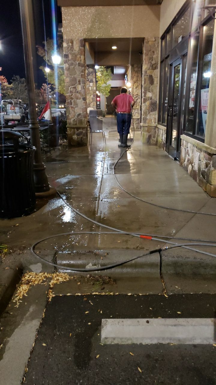 contrete cleaning using cleaner by Power Wash Masters LLC