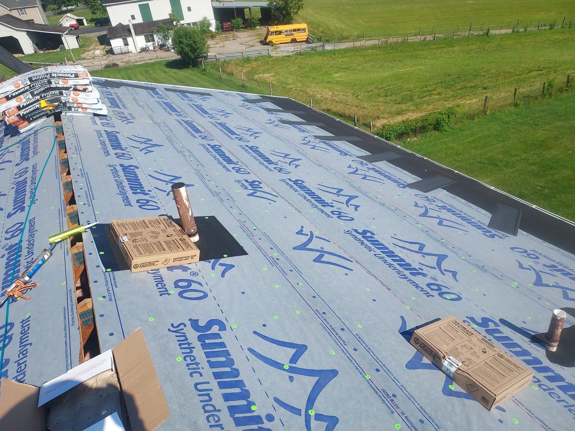 Residential Roofing Installation using Atlas Pinnacle Pristine Pewter Architectural Shingles by Frederick Roof Repair