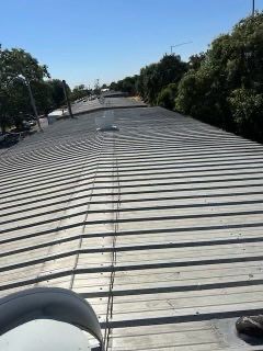 MR Roofing system (Metal Restoration System) using Conklin BenchPly system with PUMA top coat by Straight Edge Roofing Inc