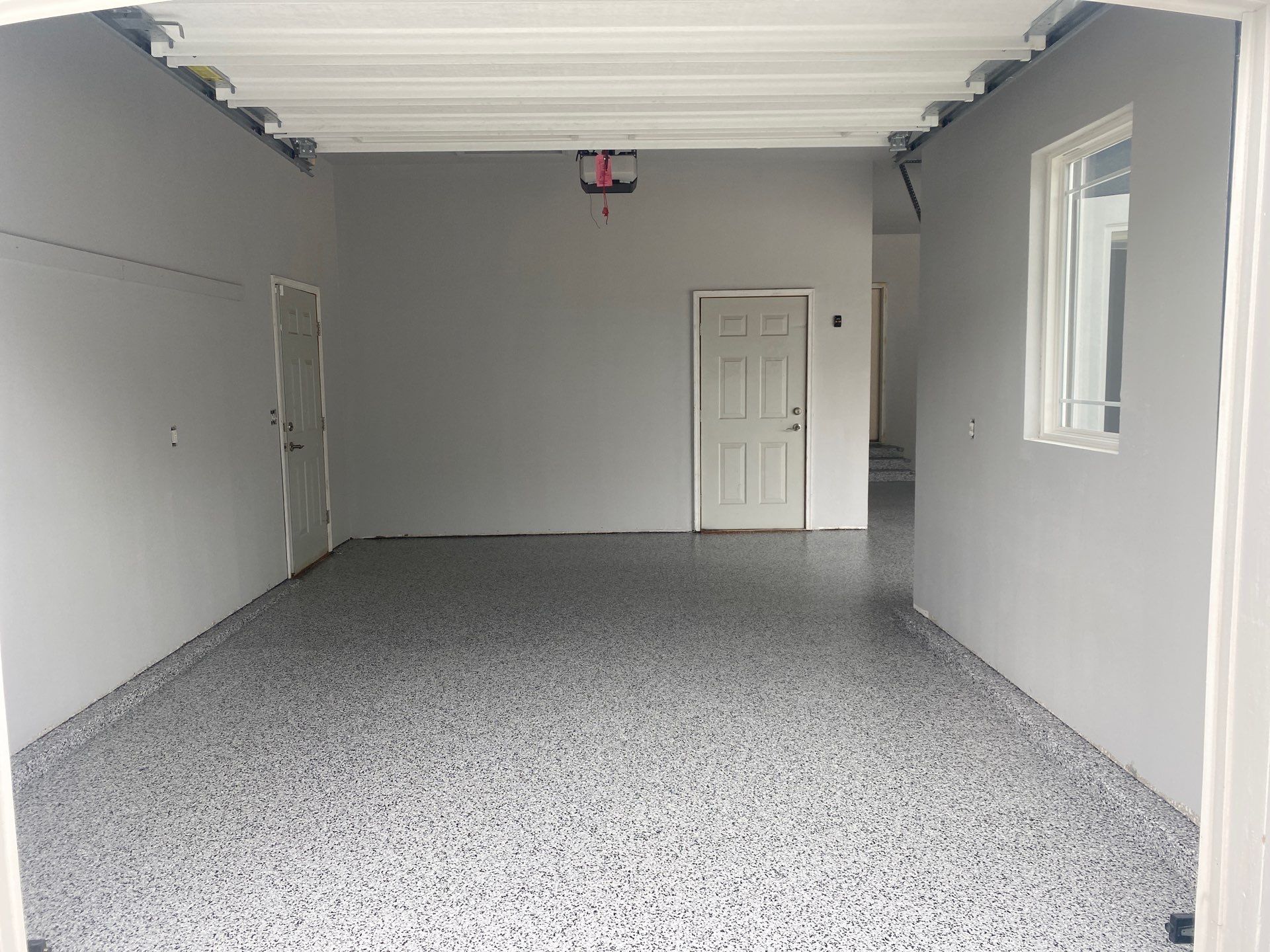 Dennis P. upgraded his garage and patio with a new flake floor by Banner Garage