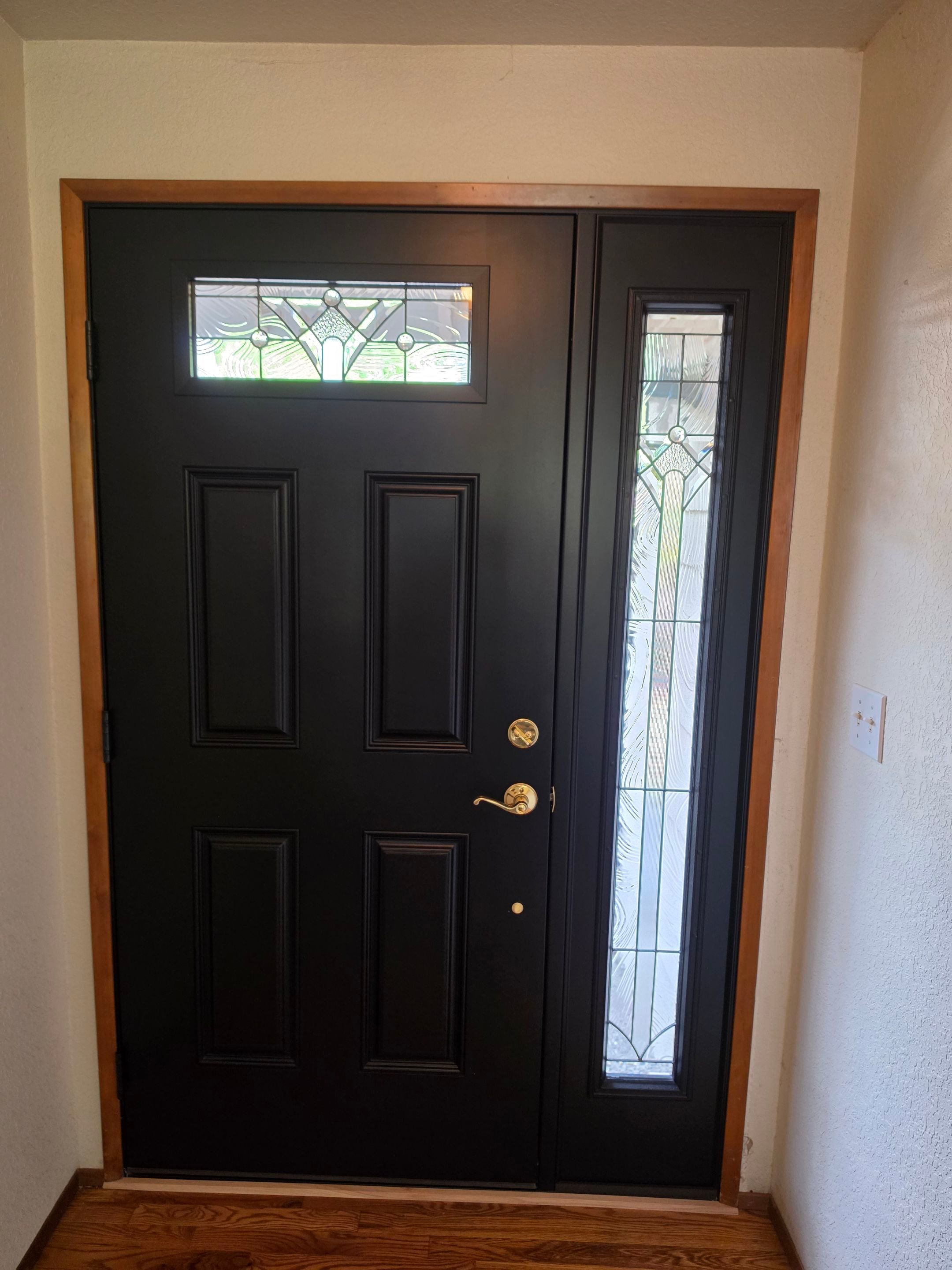 Modern Black Entry Door and Sidelight Installation in Bothell by Emerald City Energy 