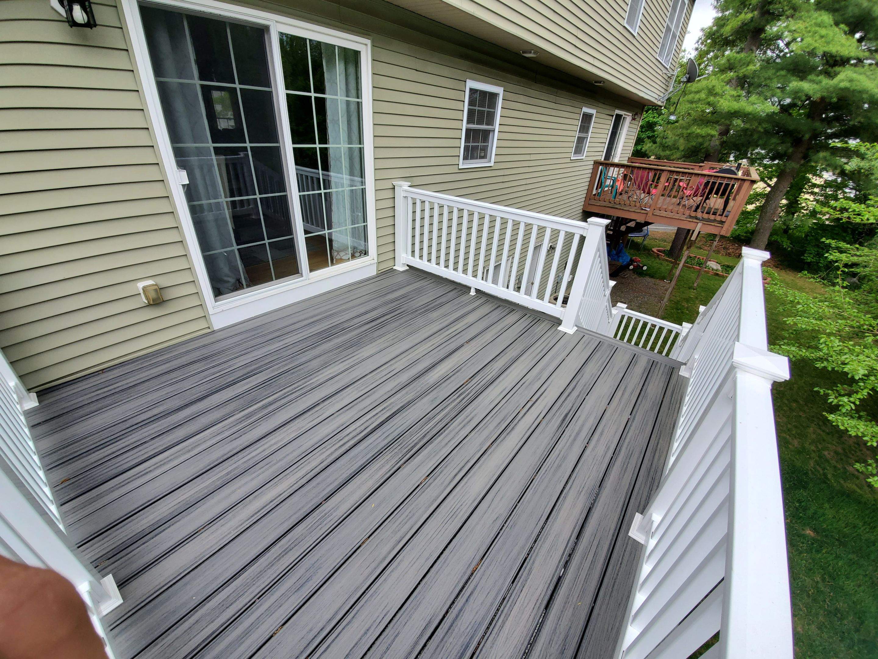 Porch/Deck Construction using Trex Decking by UBrothers Construction
