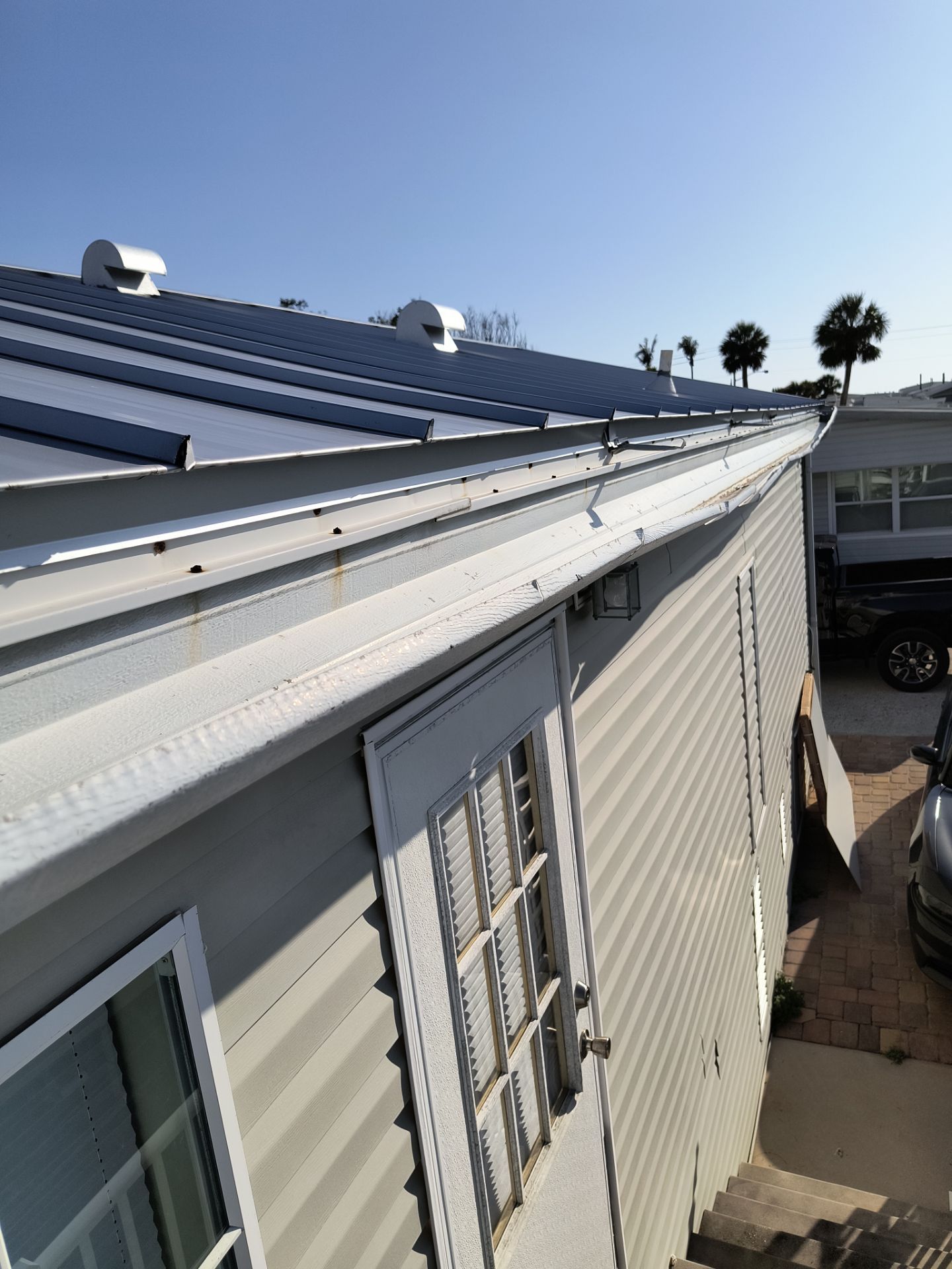 White K-Style Gutters for Beach Homes in Longboat Key FL by Gutter Professors