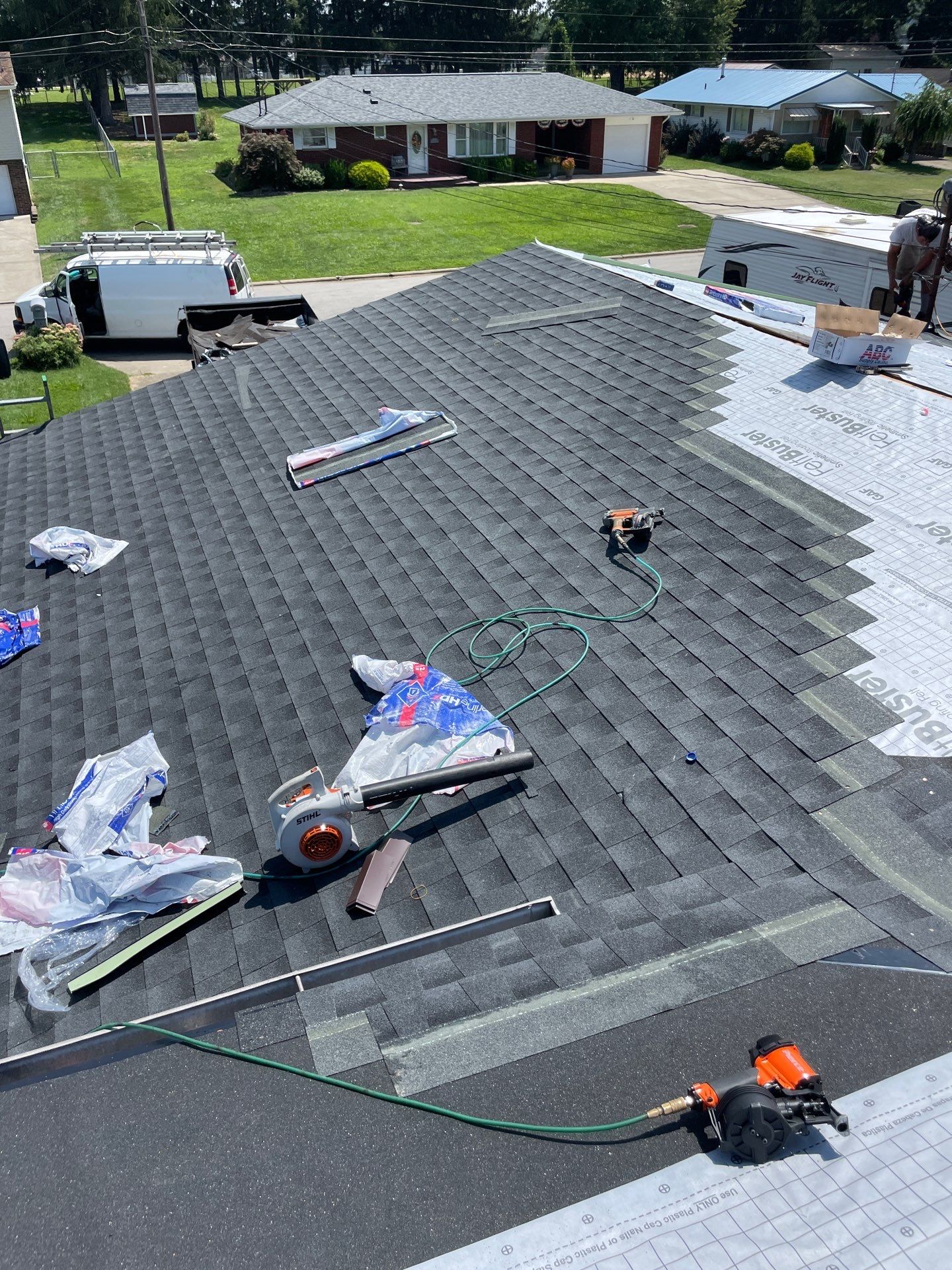 Residential Roofing Installation using GAF Timberline HDZ Charcoal by Rainstoppers Roofing