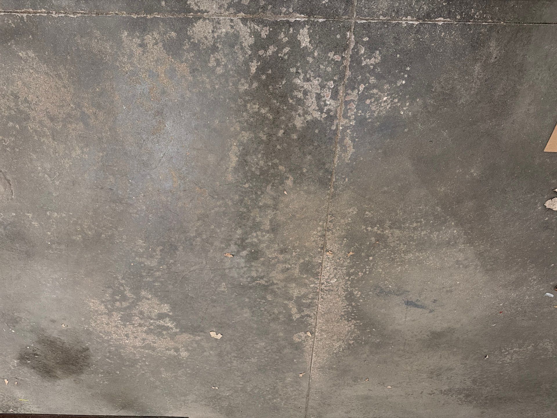 Tidal Wave Flake Garage Floor Installation in Sioux Falls by Select Painting, Coatings & Garage Cabinets