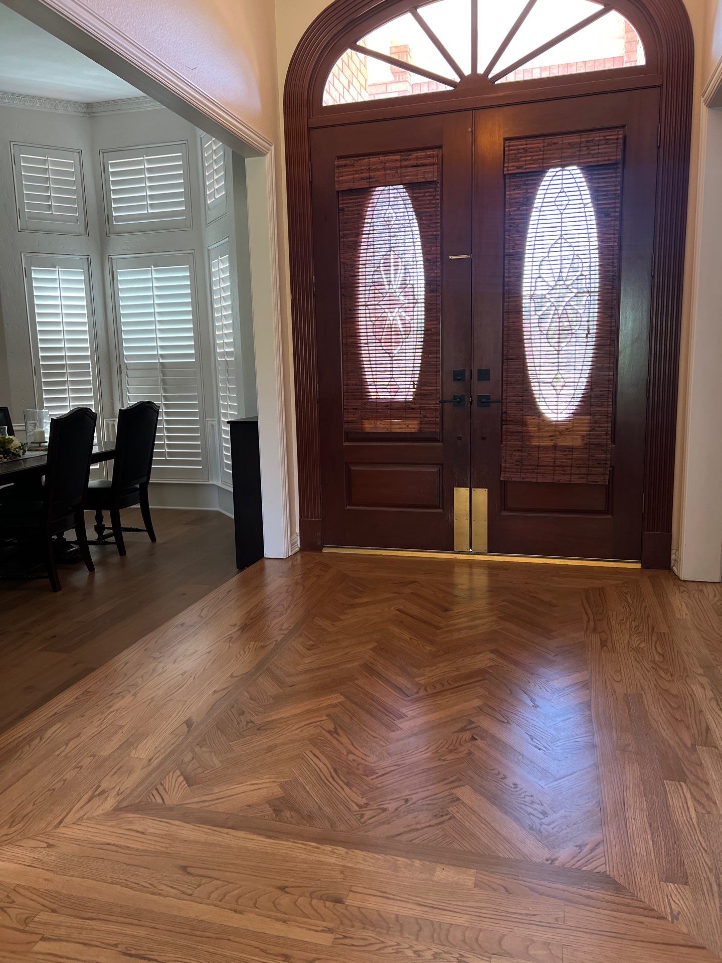 Wide-Plank Wood Flooring Replacement and Custom Herringbone Entryway by Simmons Floors 