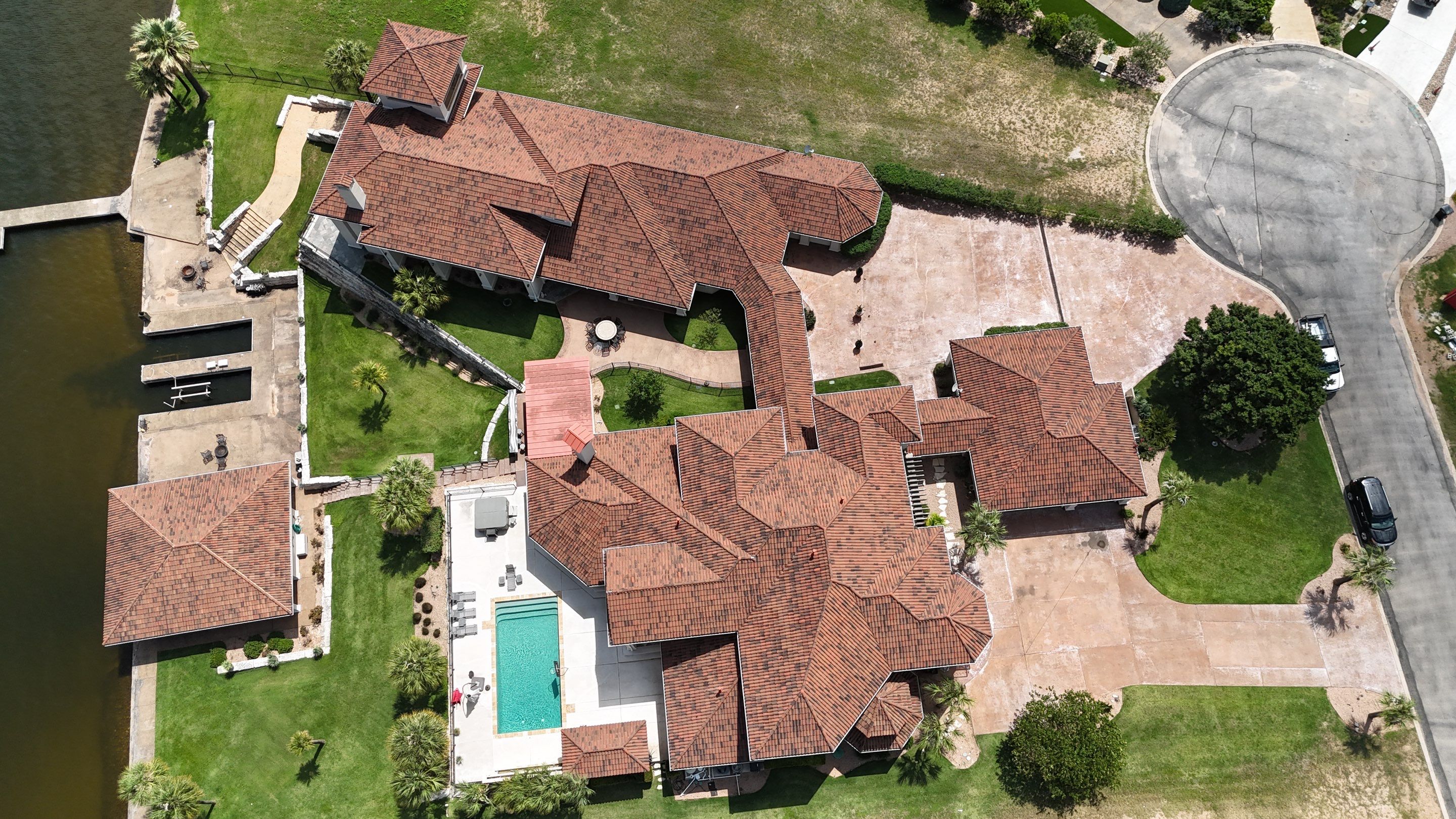 Residential Roof Replacement using Tile - Claymex Half Barrel by Action Exteriors Austin