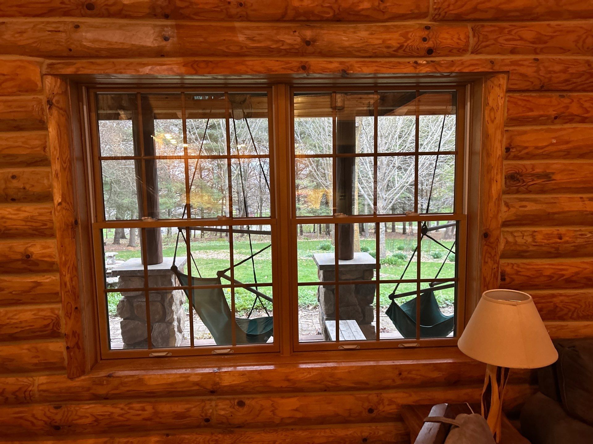 Pella Window installation using Pella Lifestyle wood/Aluminum window by United Windows and Siding LLC