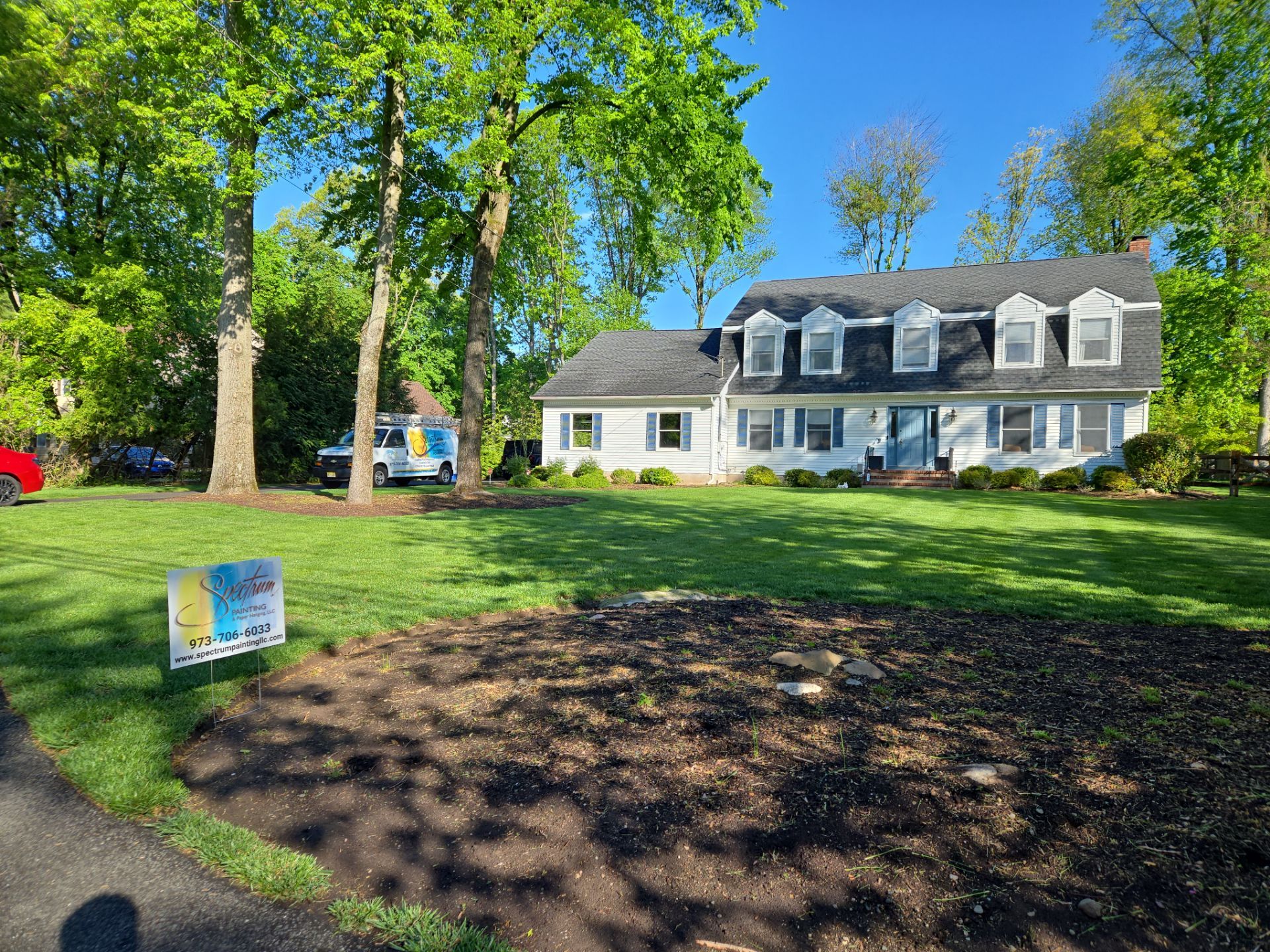Exterior Home Painting and Garage Epoxy Floor Coating in Wyckoff by Spectrum Painting, LLC