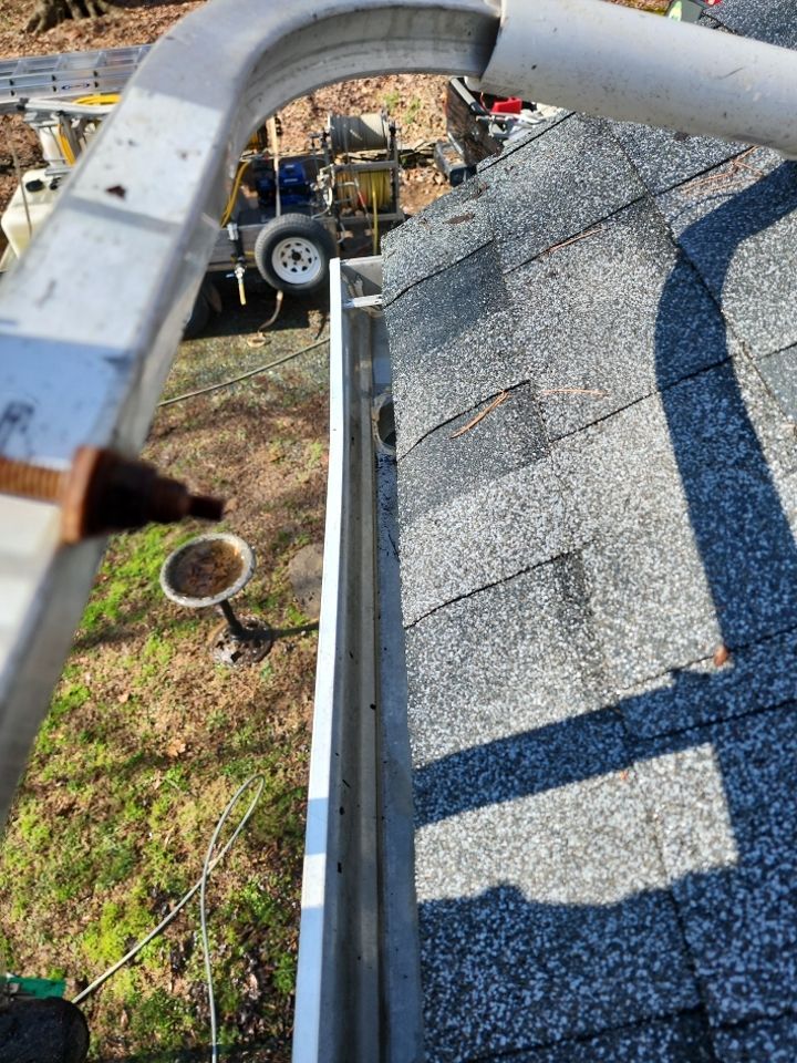 Gutter Cleaning using water by Power Wash Masters LLC